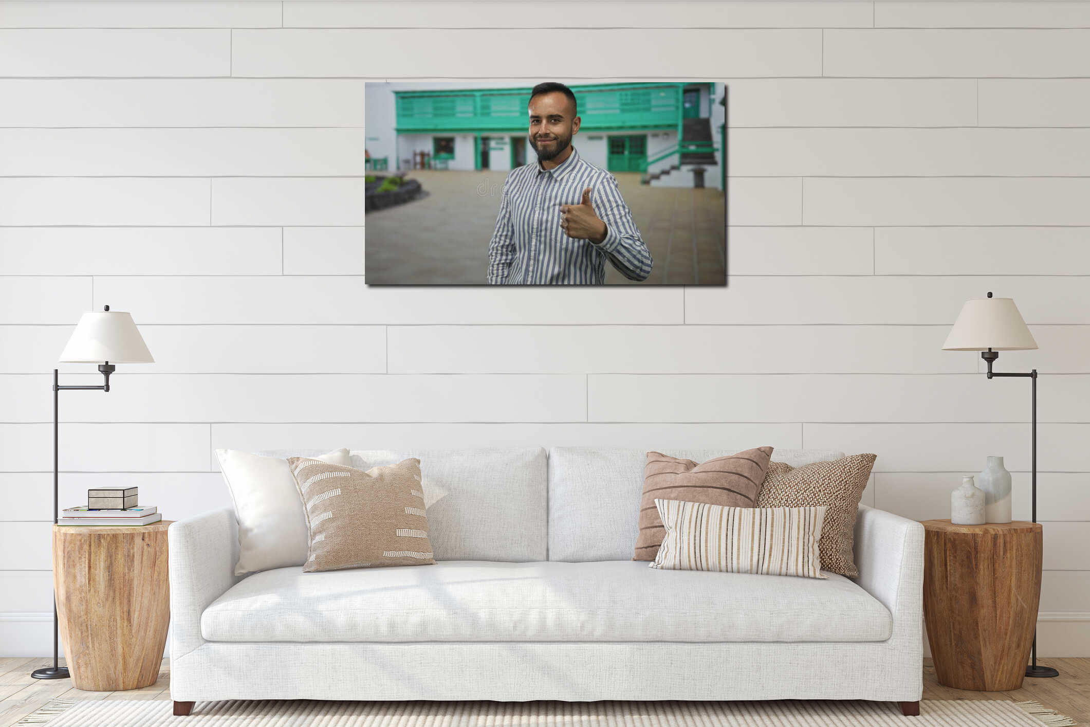 Man gives thumbs up with right thumb visible in front of a green building courtyard, smiling and winking; approval encouragement interior mockup