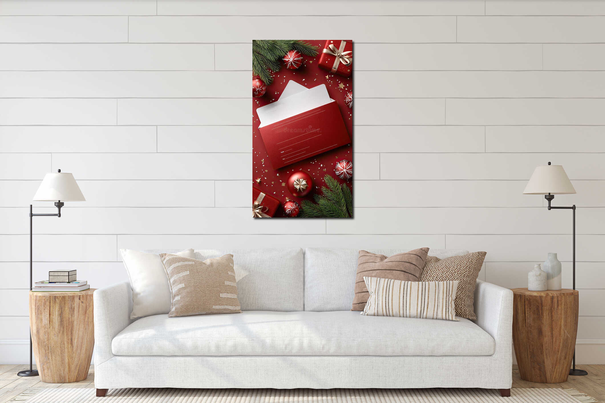 Bright red card rests on a smooth surface with green pine branches and shiny ornaments, creating a holiday atmosphere of interior mockup