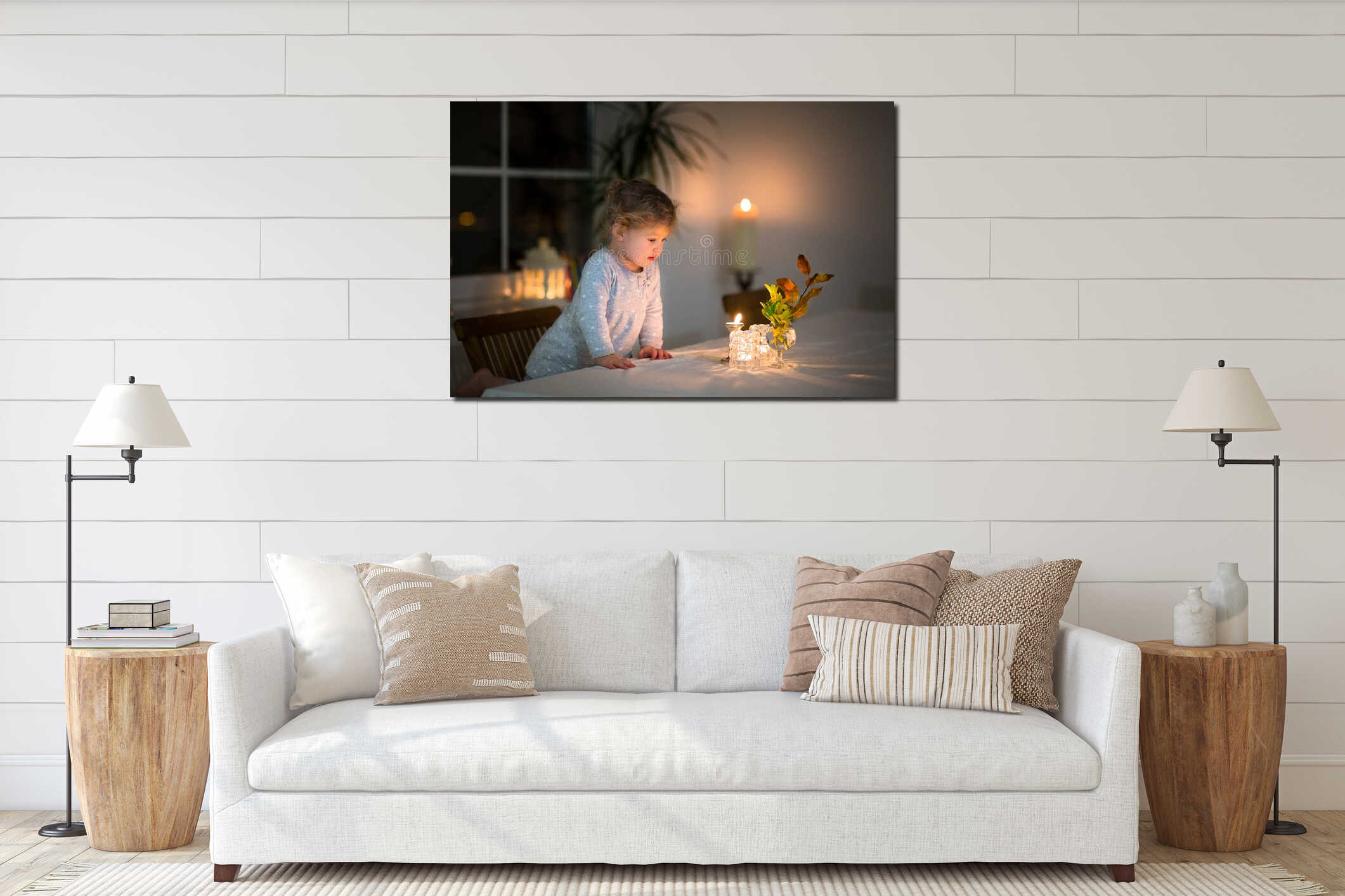 Portrait of little girl watching candles in dark room interior mockup