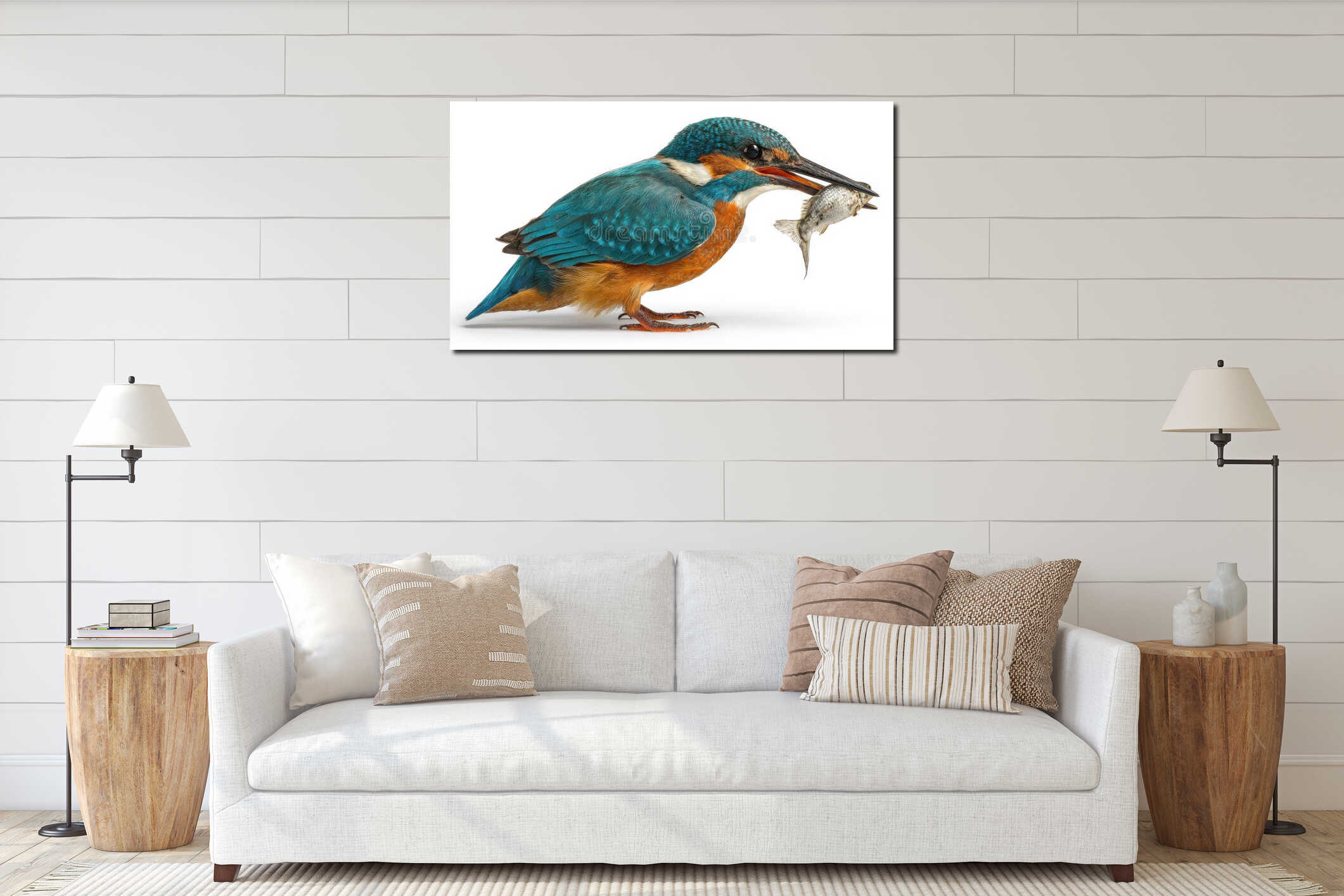 Common kingfisher bird holding small fish in orange beak, displaying brilliant turquoise blue and orange plumage, perched on white interior mockup