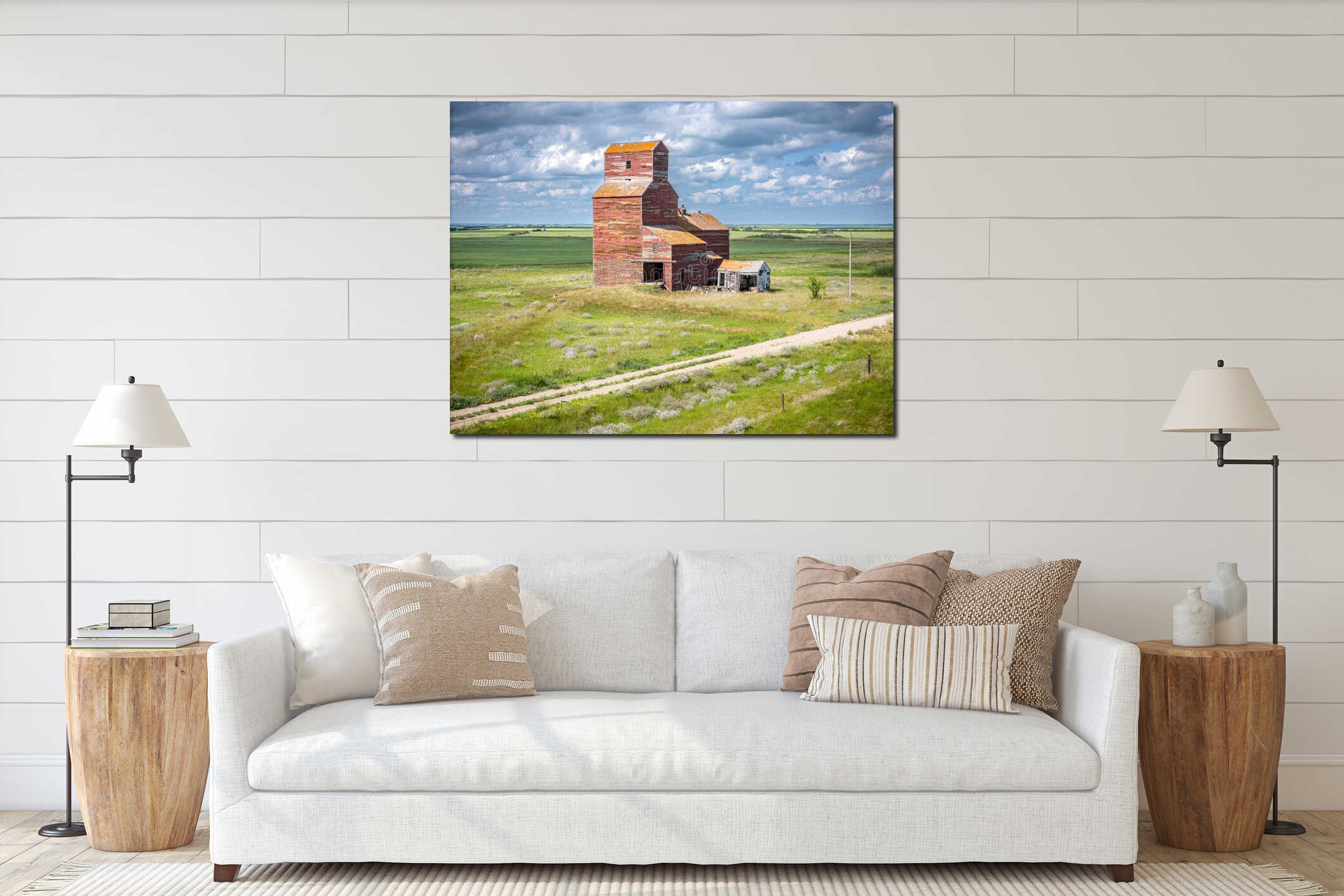 Red grain elevator sits in a field with a road in front of it interior mockup