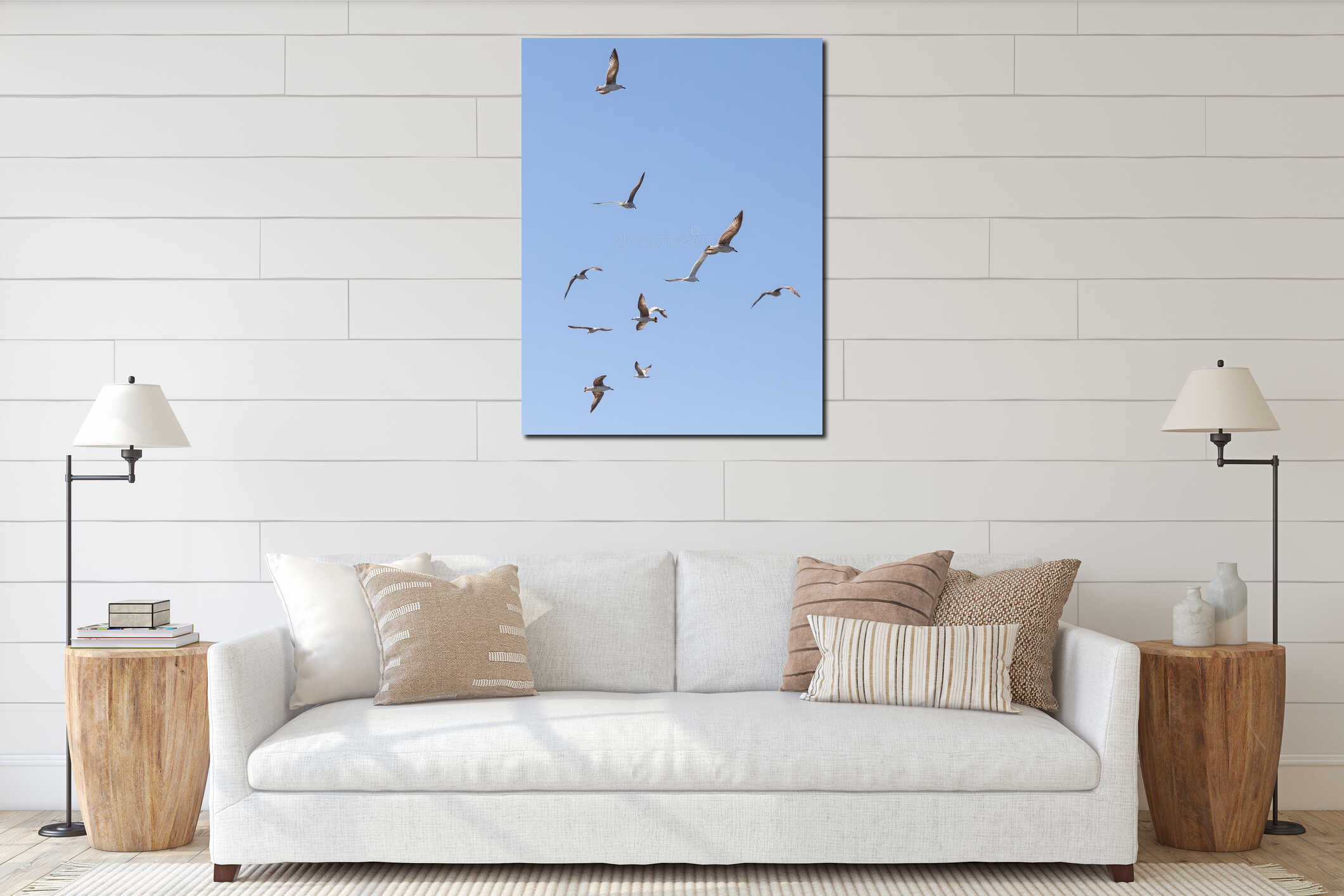A flock of seagulls flying in the sky interior mockup
