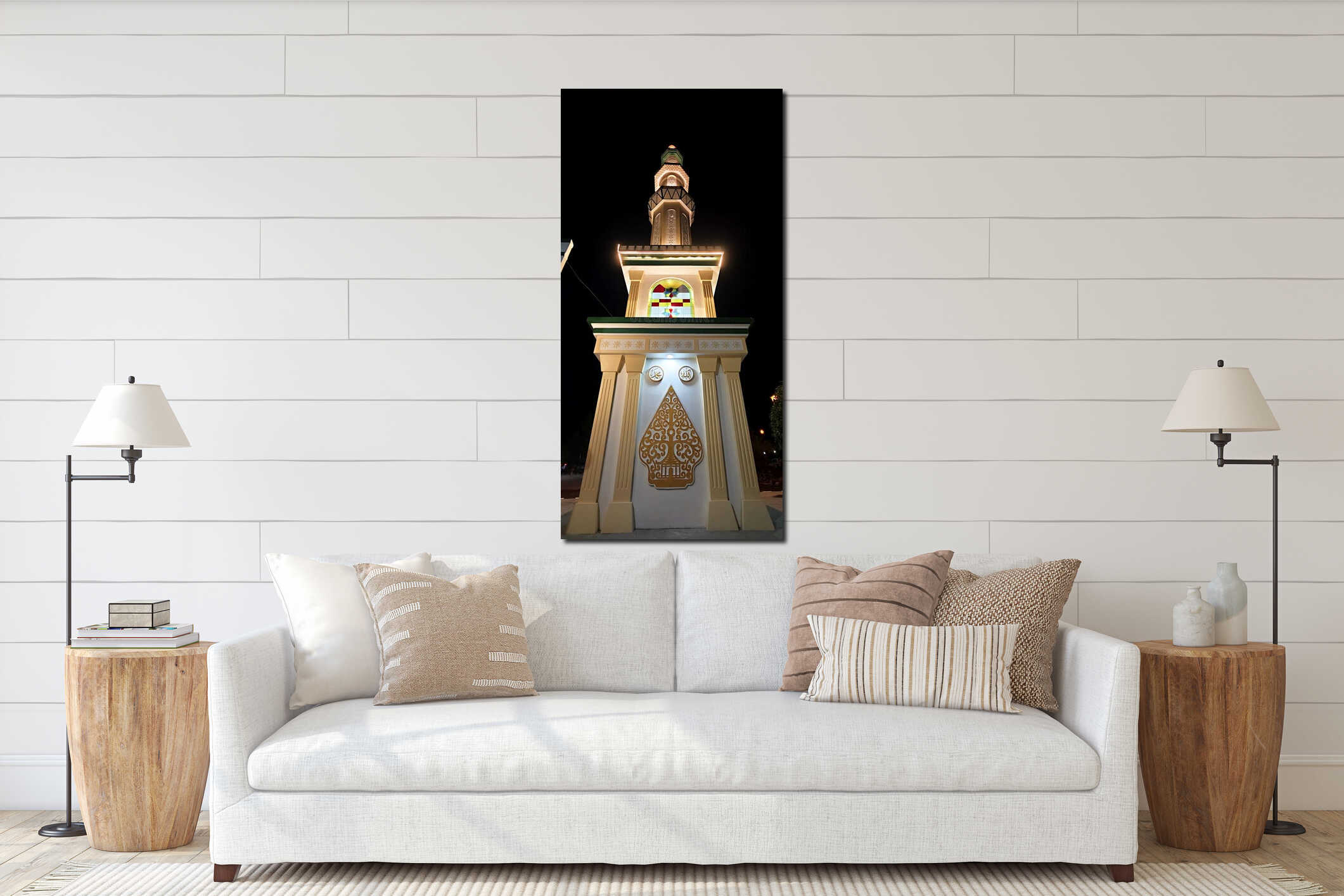 ?This is a striking vertical shot of a mosque minaret illuminated at night, set against a completely dark sky interior mockup