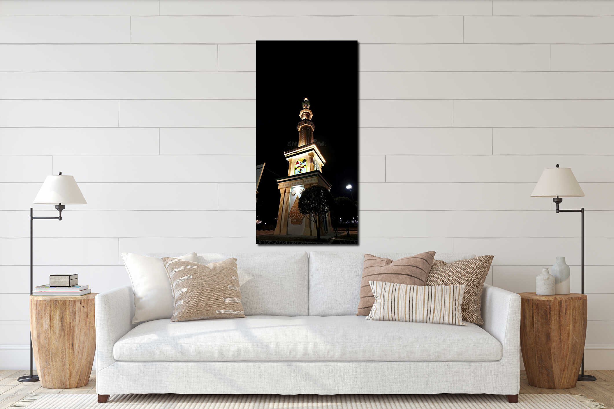 ?This is a striking vertical shot of a mosque minaret illuminated at night, set against a completely dark sky interior mockup