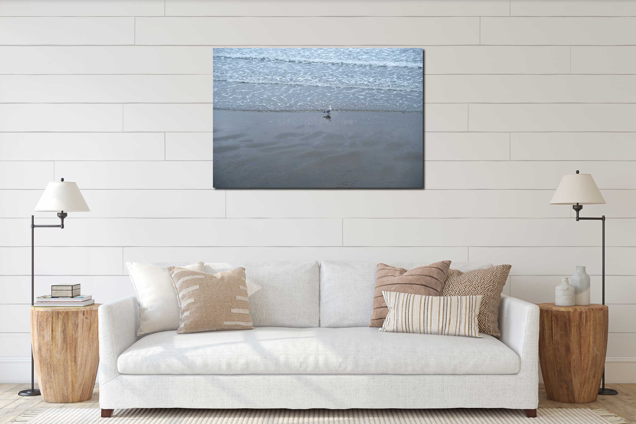 Single Seagull Standing at the Edge of Waves on a Sandy Beach interior mockup