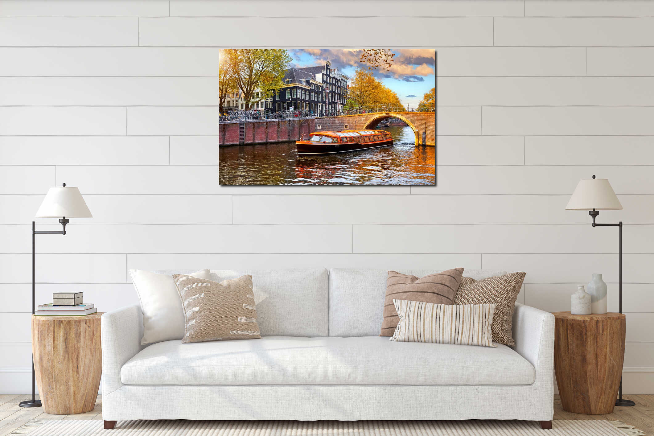 Channel in Amsterdam Netherlands. Pleasure boat by the bridge. Landmark old European city spring landscape with sunshine. Houses interior mockup