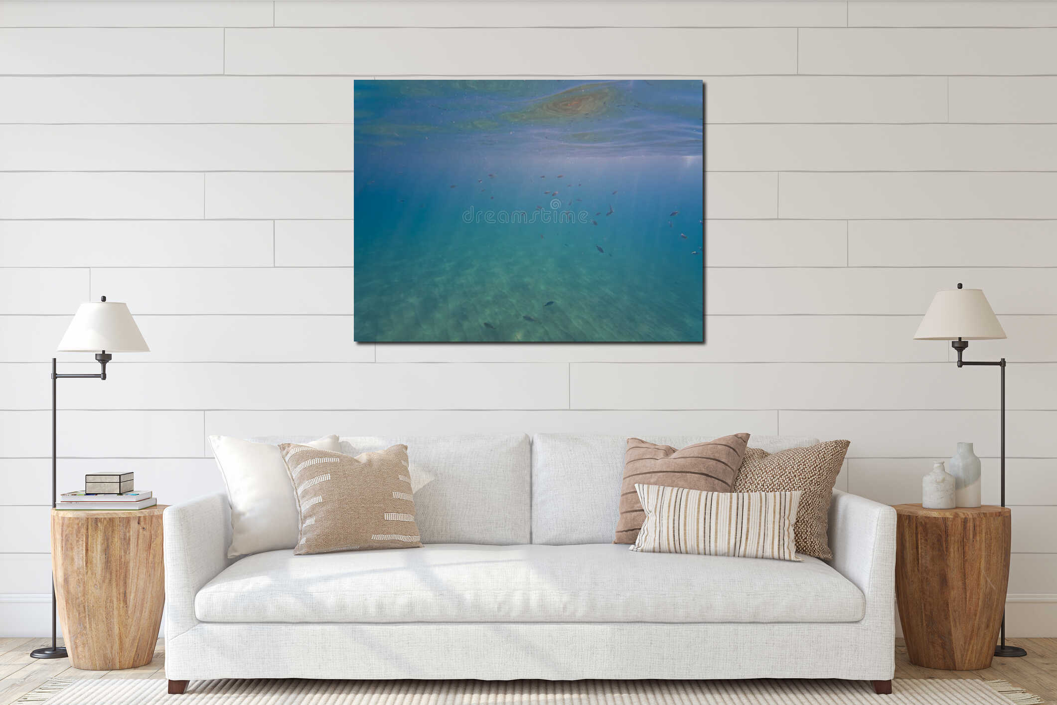 Underwater landscape in Cannes France featuring a school of small fish swimming in turquoise Mediterranean sea water with sun rays interior mockup