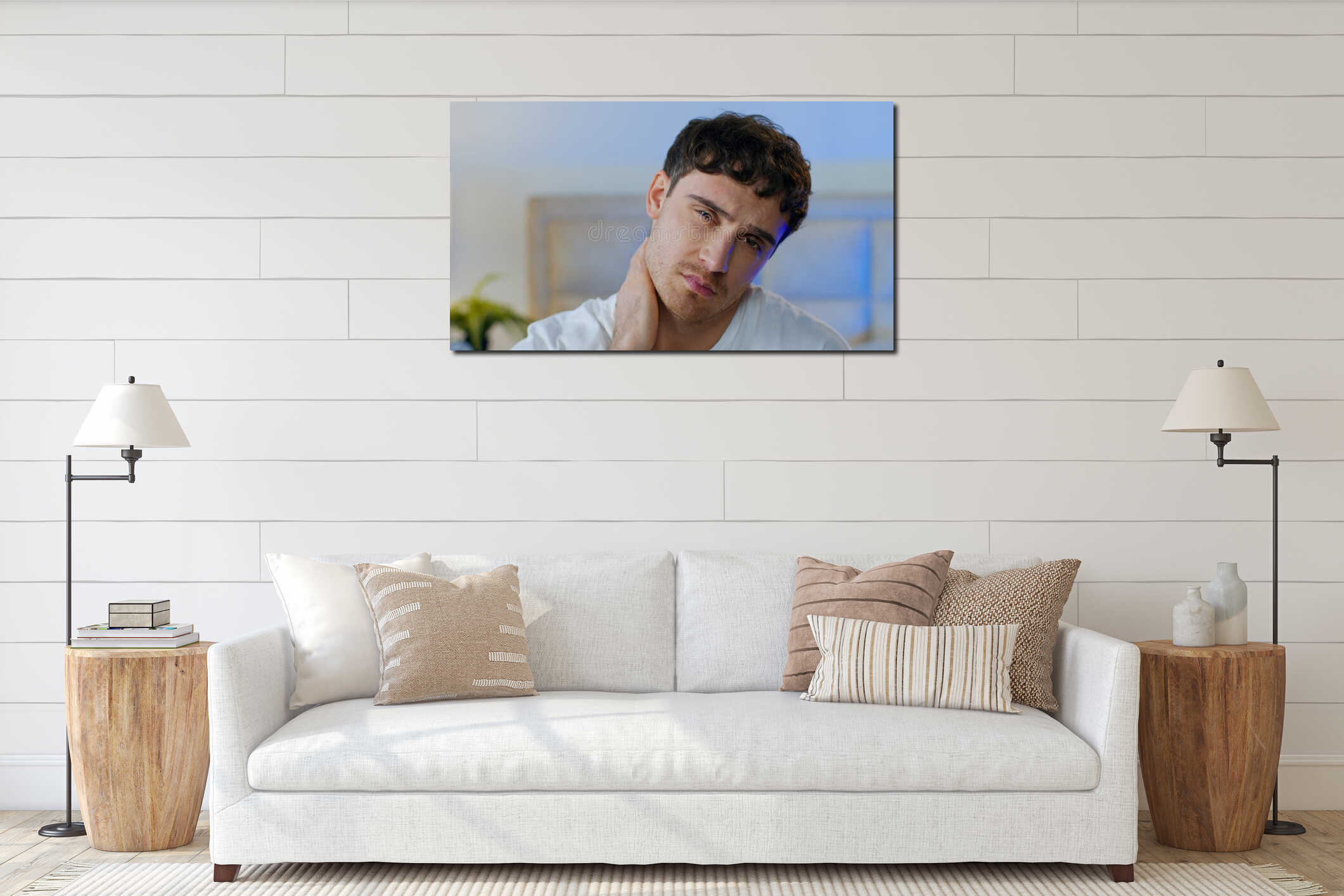 Unhappy tired young Caucasian man yawning looking at camera exhausted bored in home bedroom close up sleepy overworked interior mockup