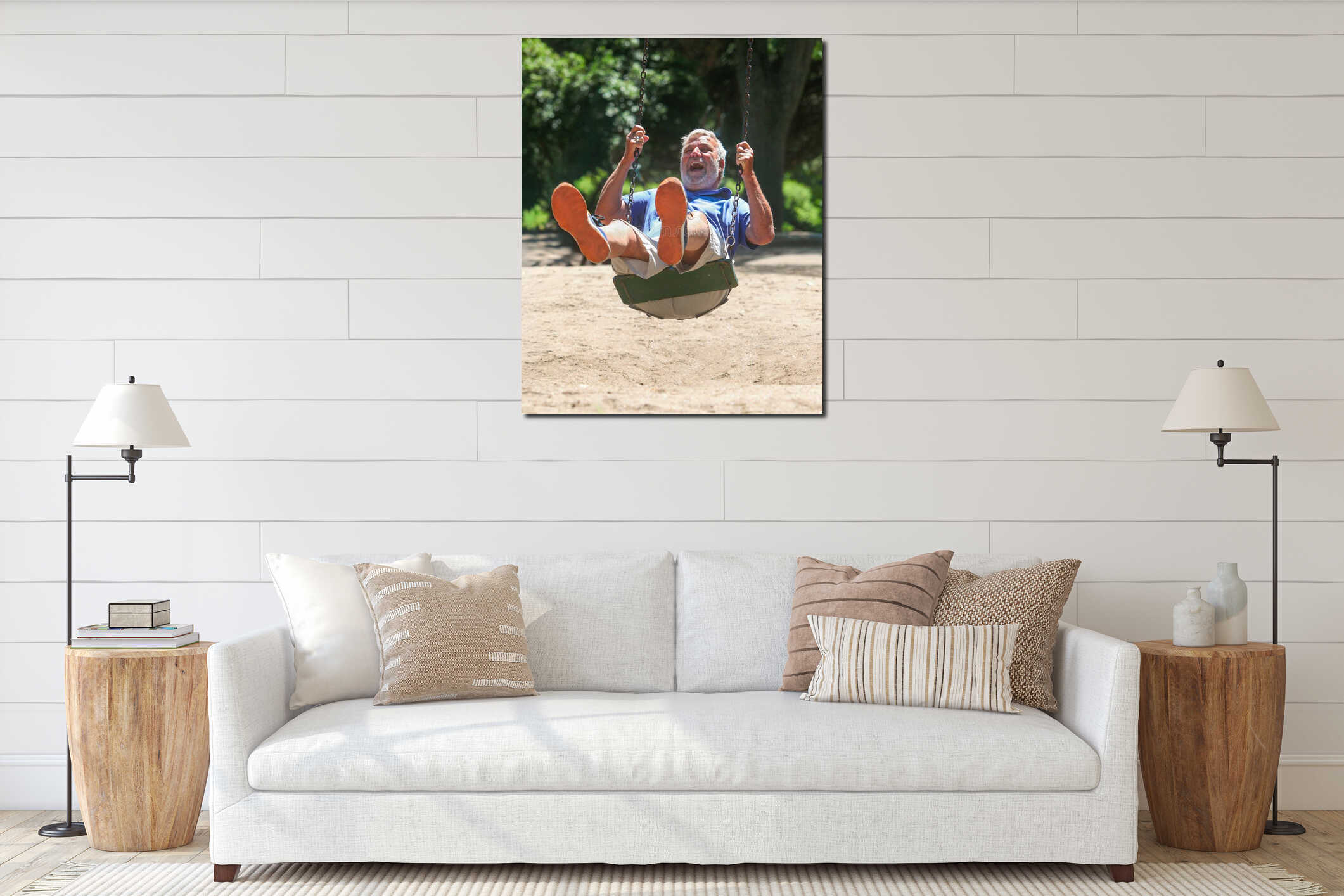 Cheerful senior man on a playground swing. interior mockup