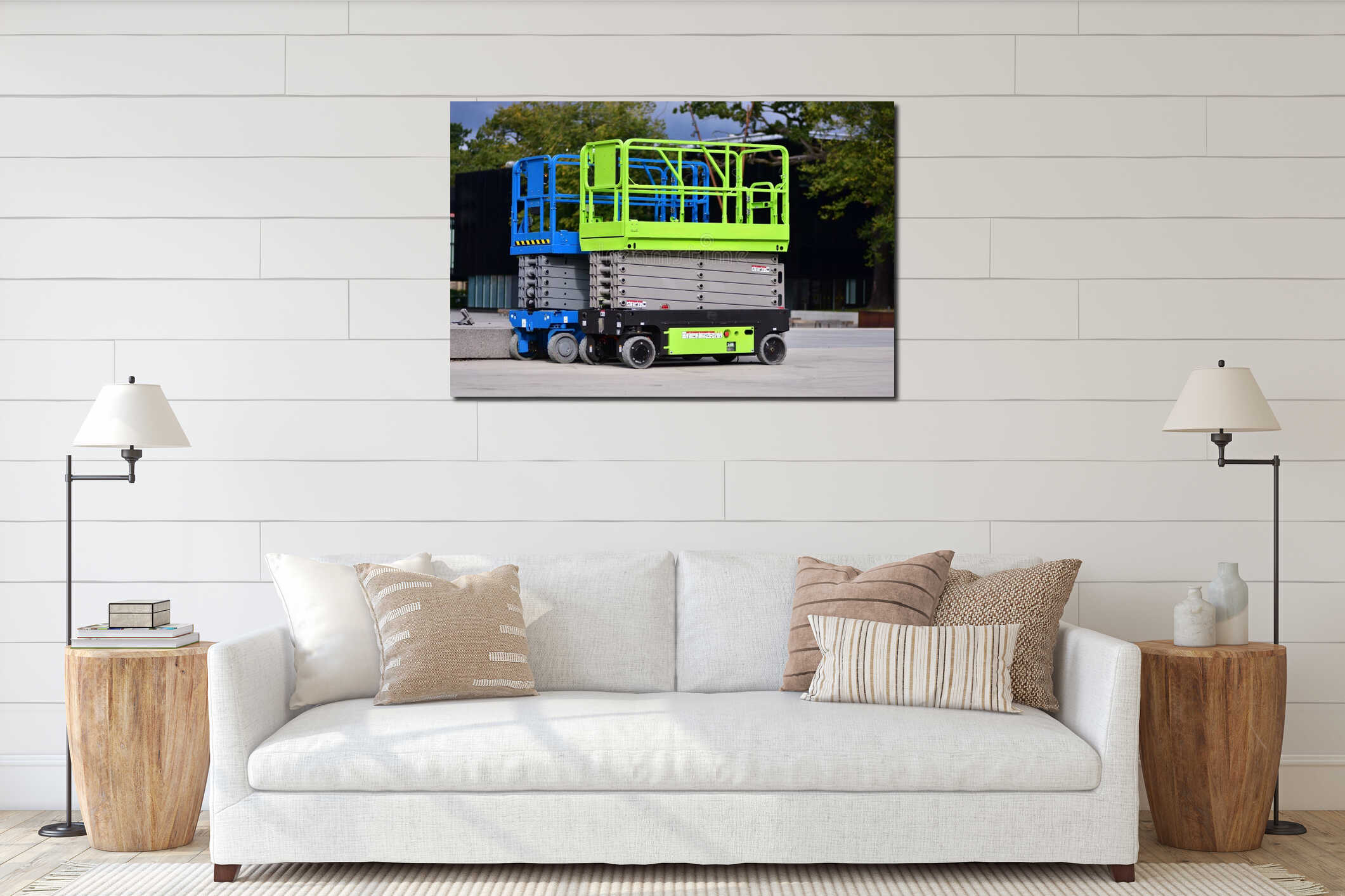 Modern electric scissor lift parked outdoors on concrete surface. Mobile aerial work platform used for construction, maintenance, interior mockup