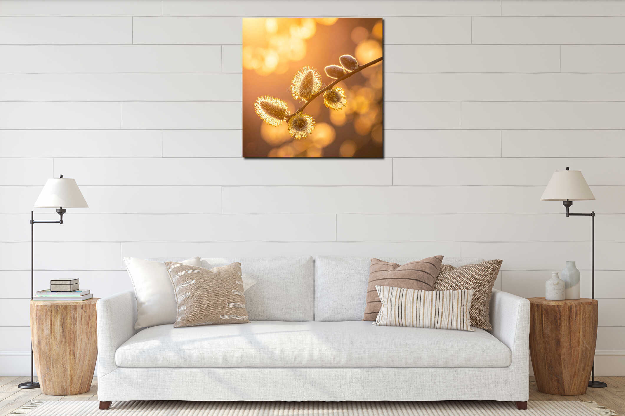 Golden sunlight illuminates delicate willow catkins on a branch in spring Keywords: willow, catkins, spring, nature interior mockup