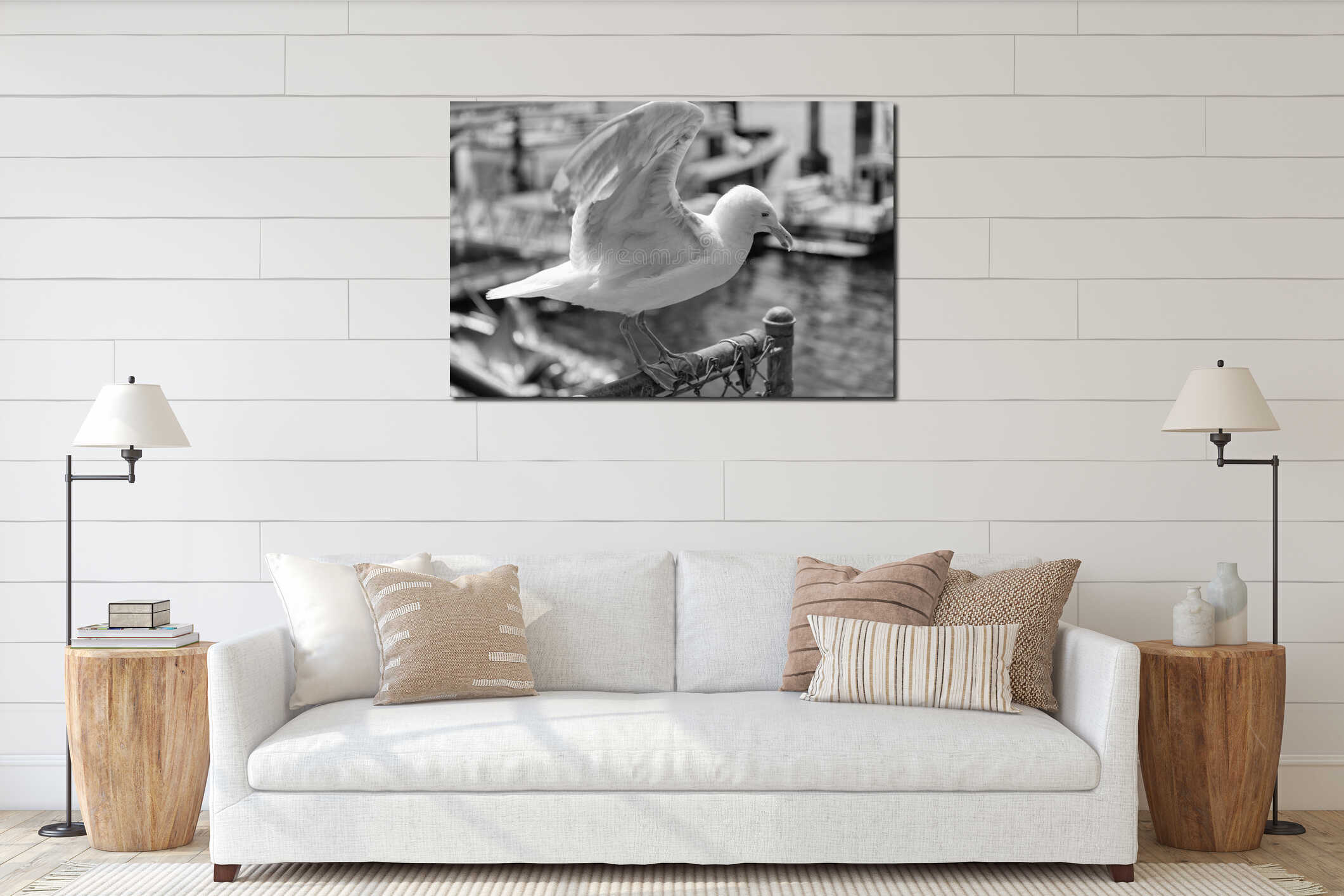 Seagull sitting outdoor. A lonely seagull at the sea. Seagull near water. Sea gull bird. Fauna and nature. Seagull bird observing interior mockup