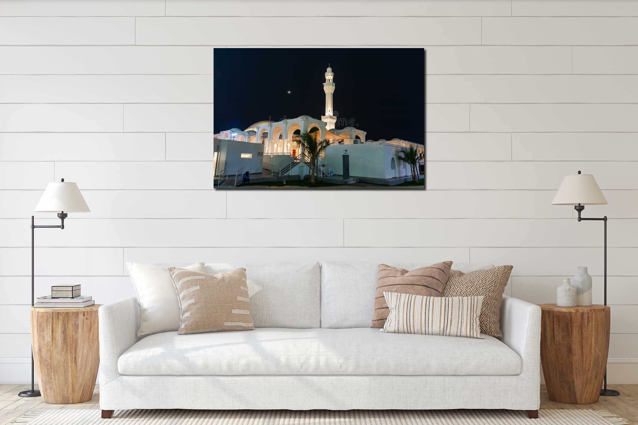 Jeddah, Saudi Arabia - December 23, 2025: Illuminated white Al Rahma Mosque, Floating Mosque, with arched walkways and tall interior mockup