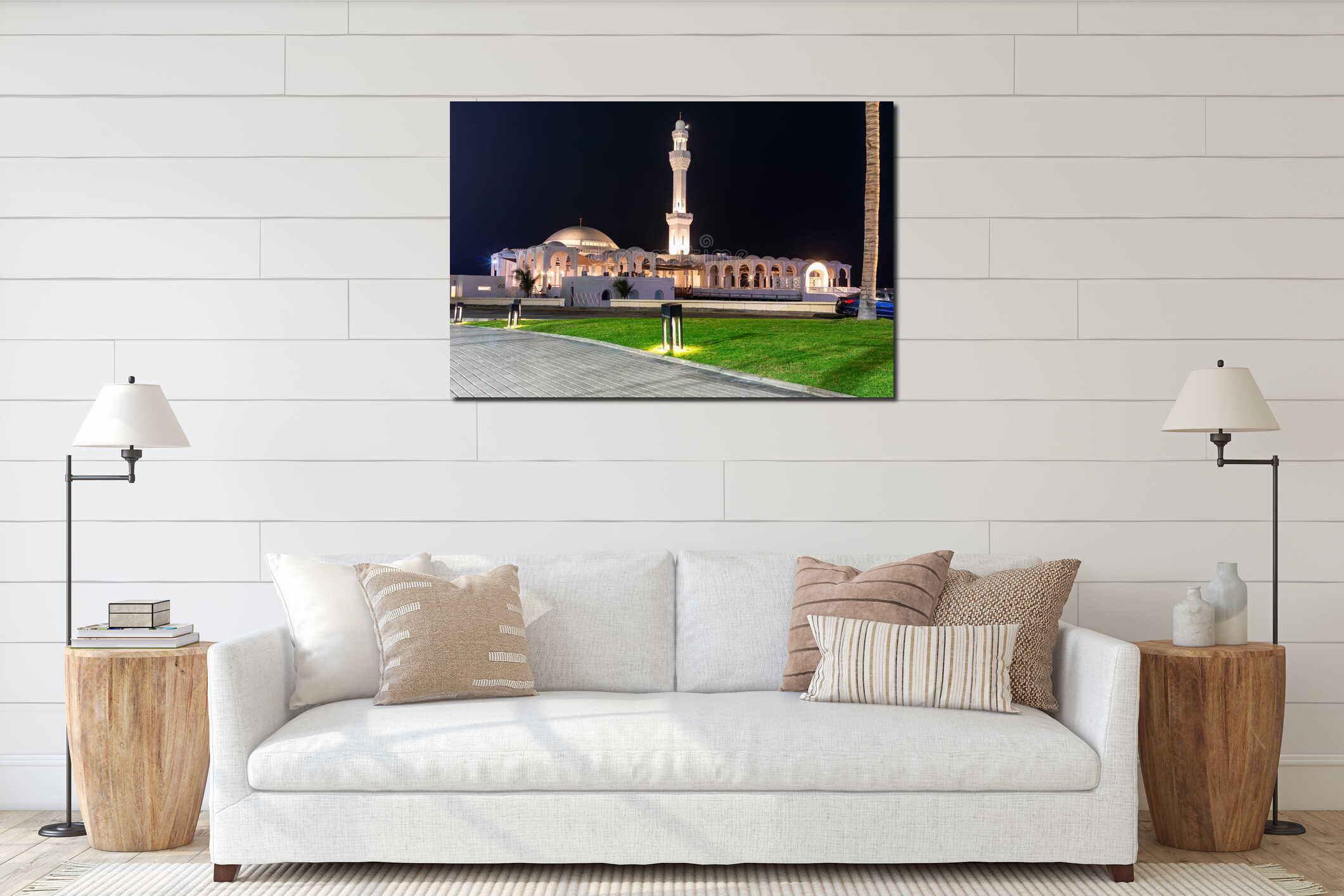 Jeddah, Saudi Arabia - December 23, 2025: Night view of white Al Rahma Mosque, Floating Mosque, with minaret and arched colonnade interior mockup