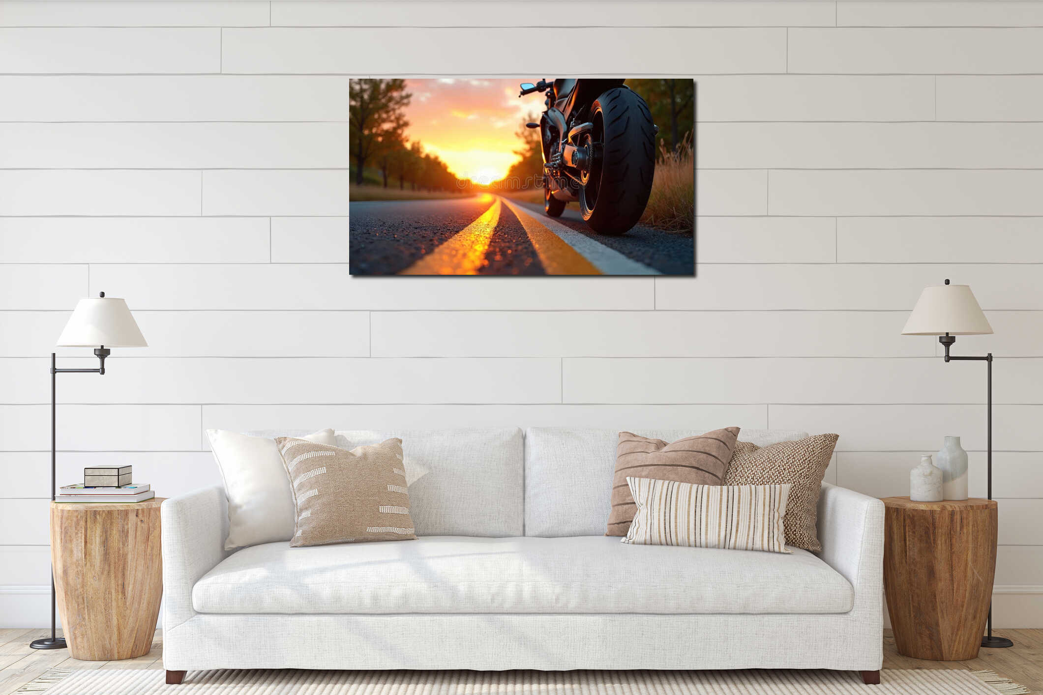 Motorcycle parked on empty road during vibrant sunset. Warm sunrays reflect on asphalt, casting golden glow on trees lining scenic interior mockup