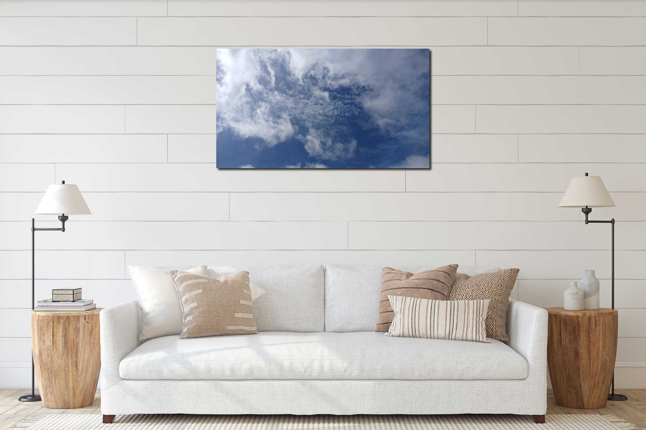 A beautiful blue sky filled with wispy white clouds and textured altocumulus patches interior mockup