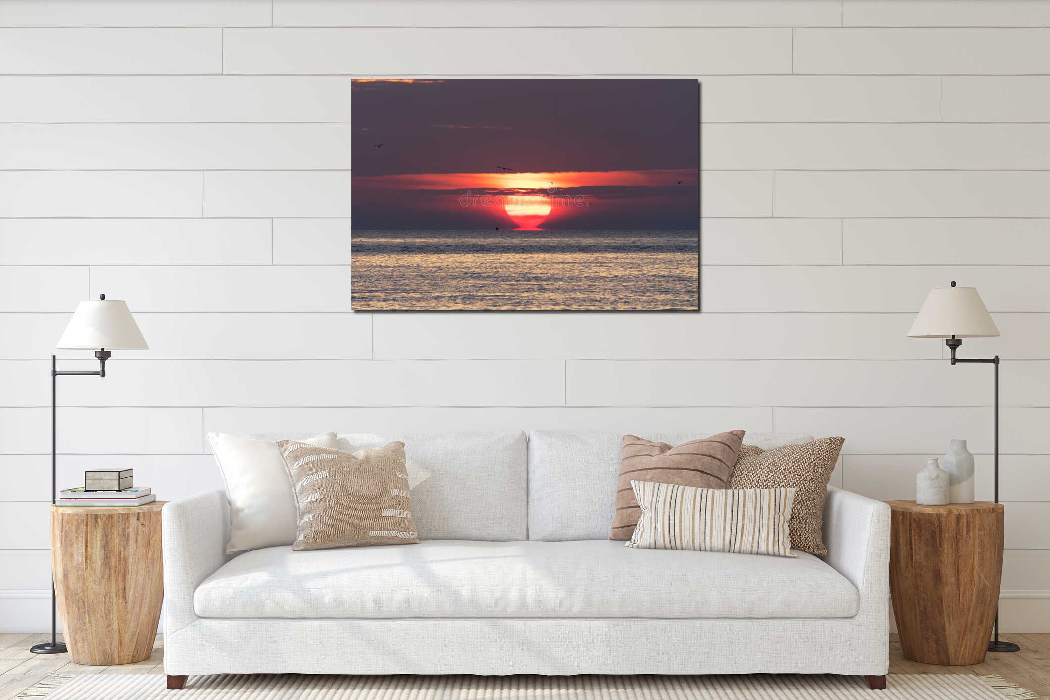Omega Sun glowing orange sunrise sea with glowing sun, scattered clouds and distant seabirds creating serene mood interior mockup