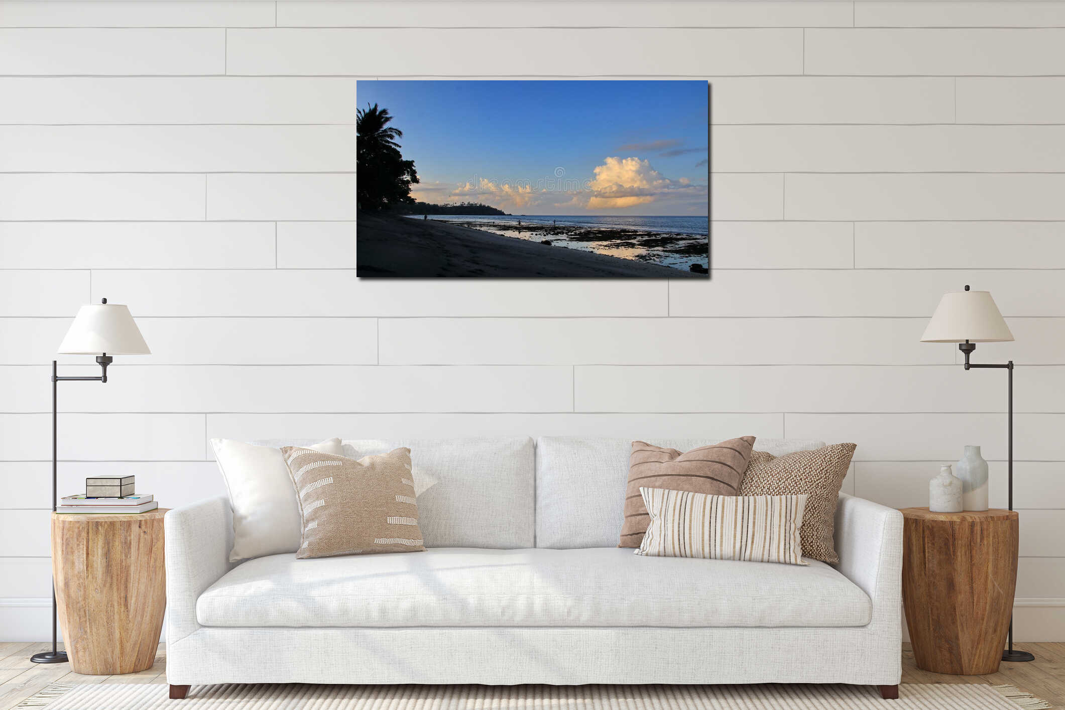 serene winter sunset over the snow-covered beach horizon where the golden sun meets the frozen ocean waves and sandy shore under a interior mockup