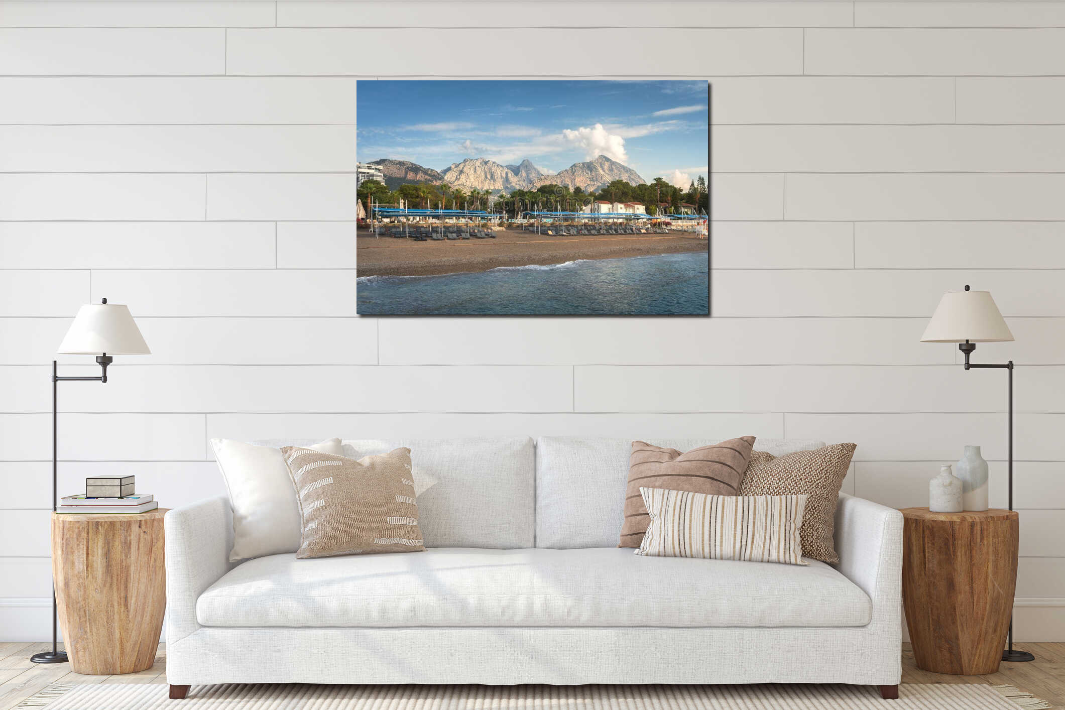 A beautiful seascape of a beach with a resort hotel in the Kemer region of Turkey. A sunny morning with Taurus Mountains visible interior mockup