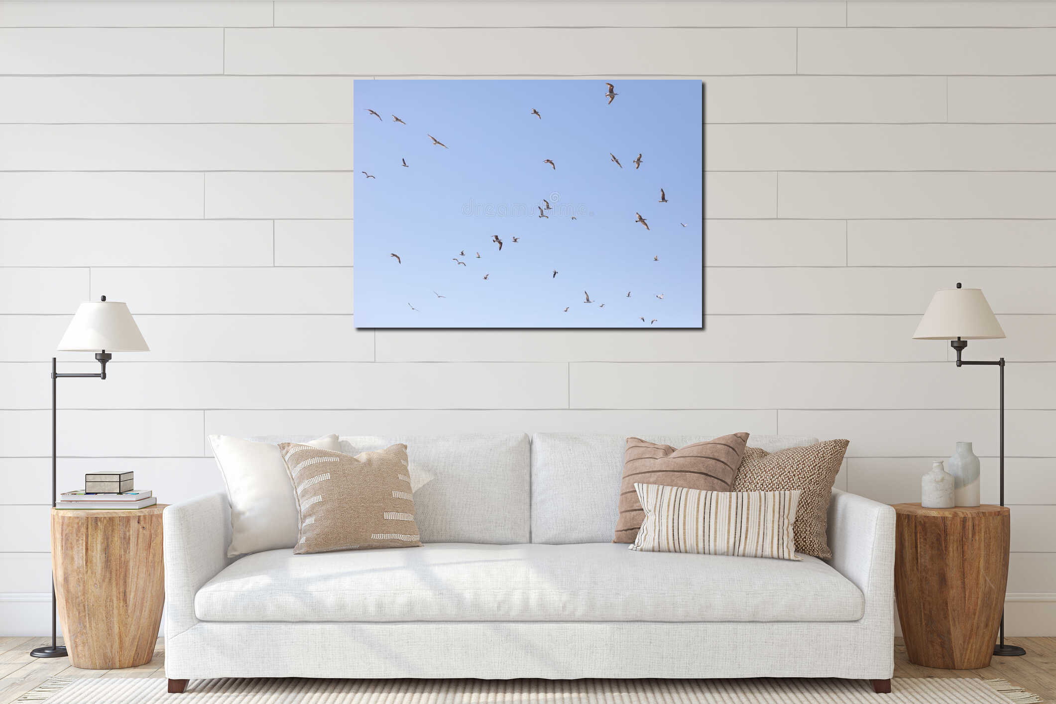 A flock of seagulls flying in the sky interior mockup