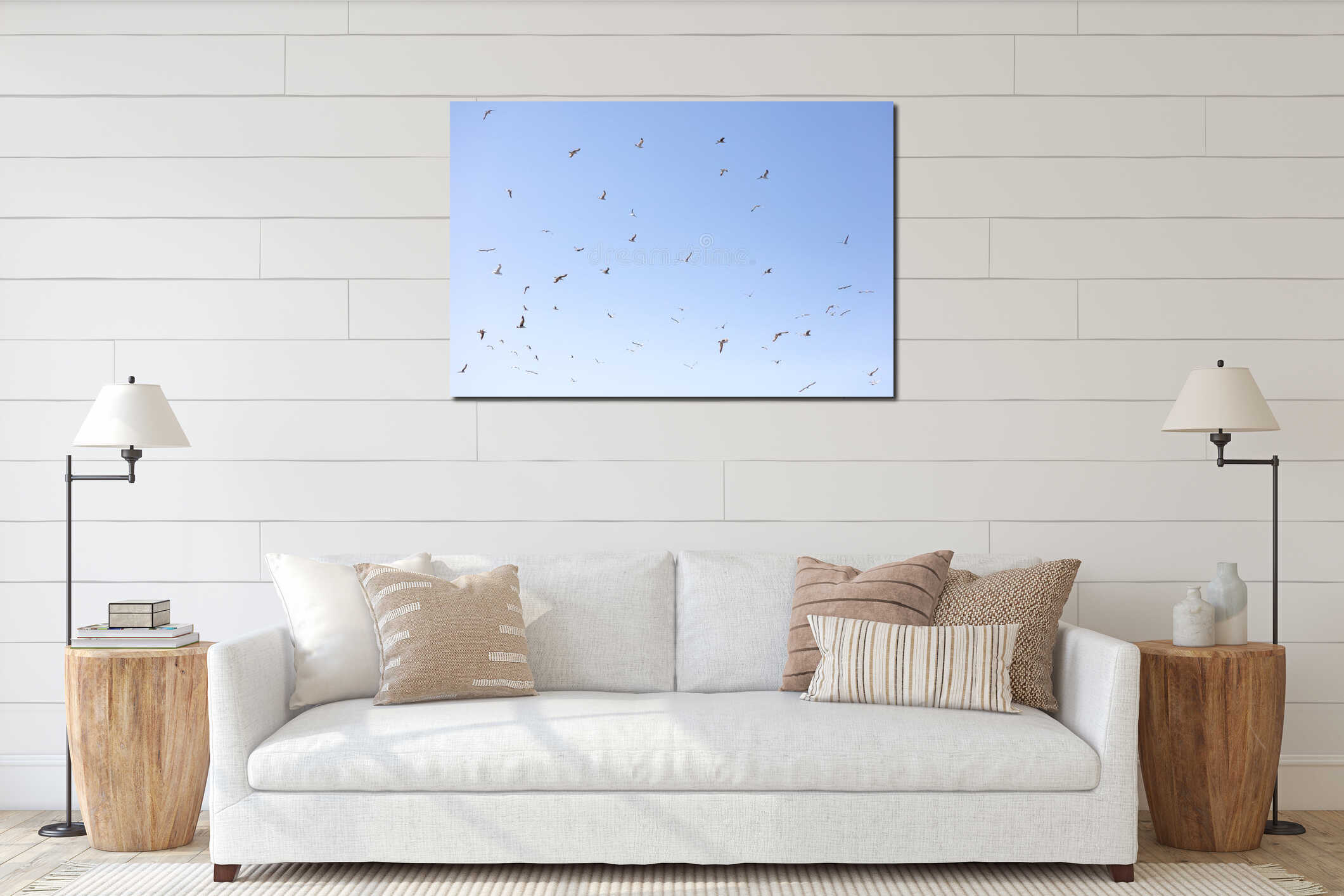 A flock of seagulls flying in the sky interior mockup