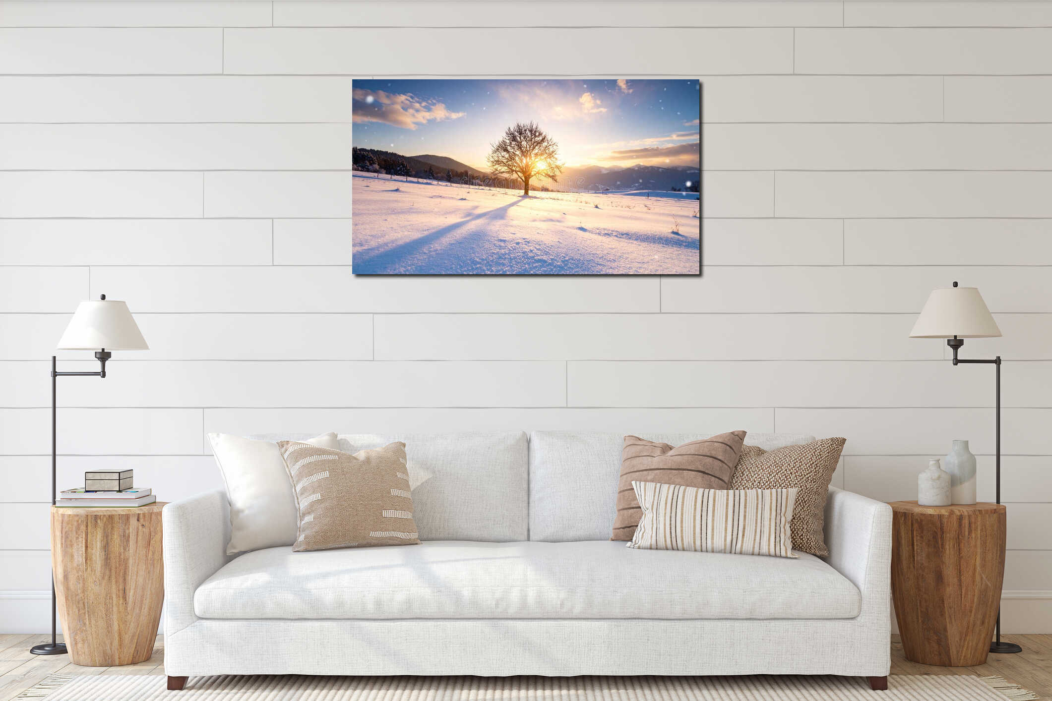 Winter landscape with a solitary tree, snow-covered field, and golden sunset. interior mockup