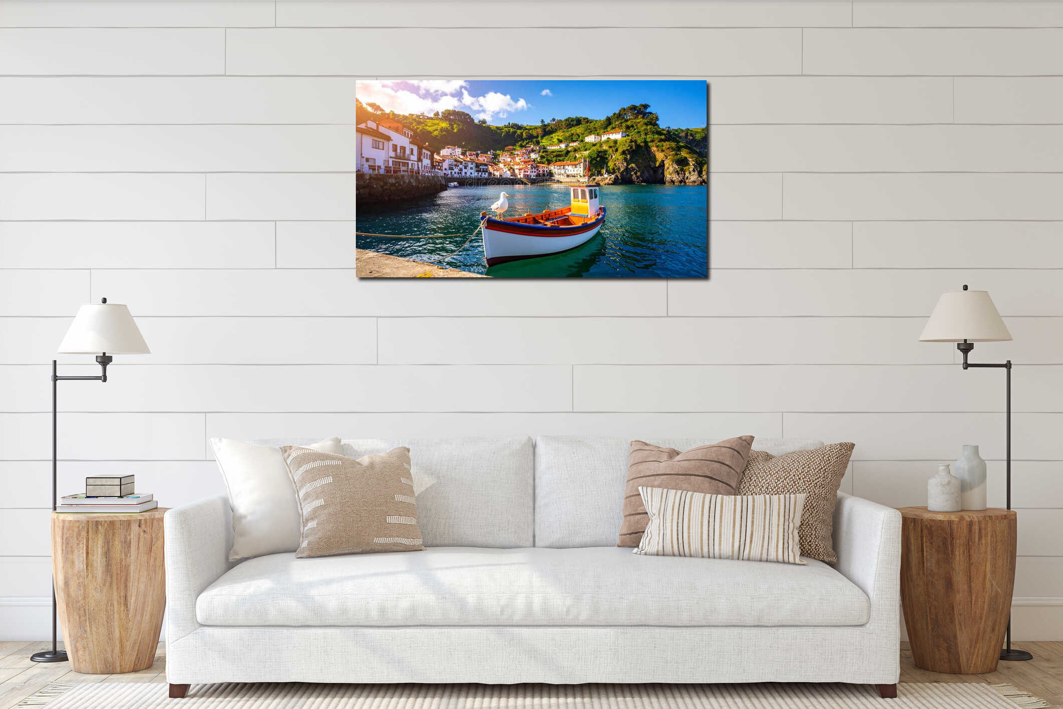 Scenic coastal village with fishing boat and seagull on a sunny day interior mockup