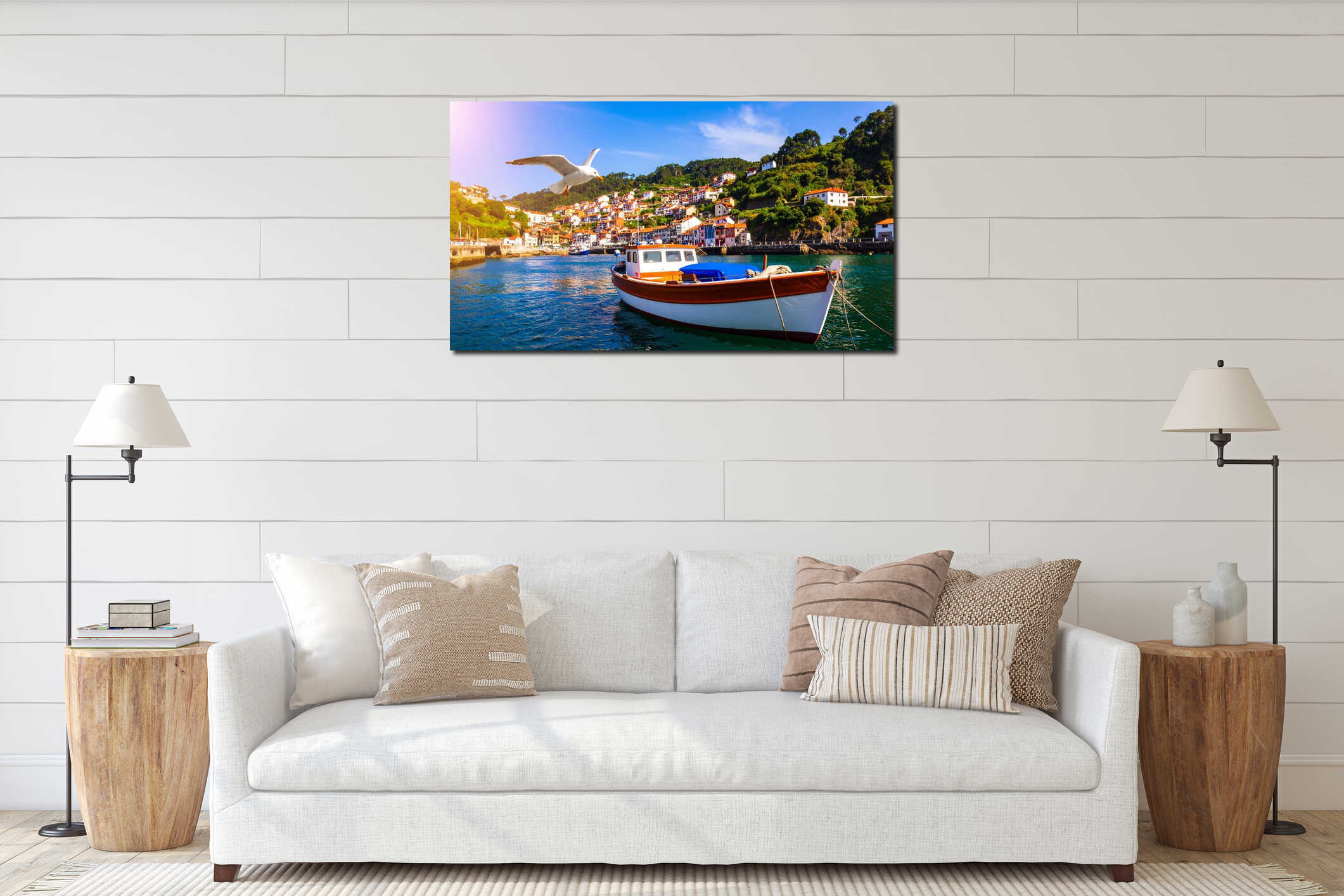 Seagull flying over fishing boat in harbor with coastal village on sunny day interior mockup