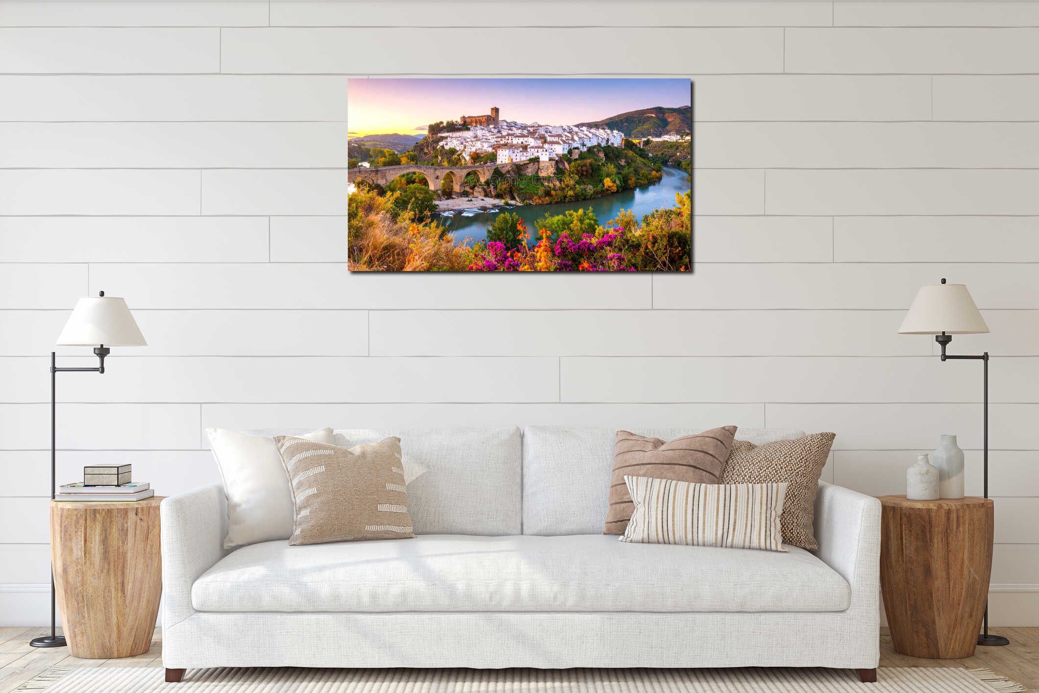 Scenic view of a historic town with white buildings and bridge over a river at sunset interior mockup