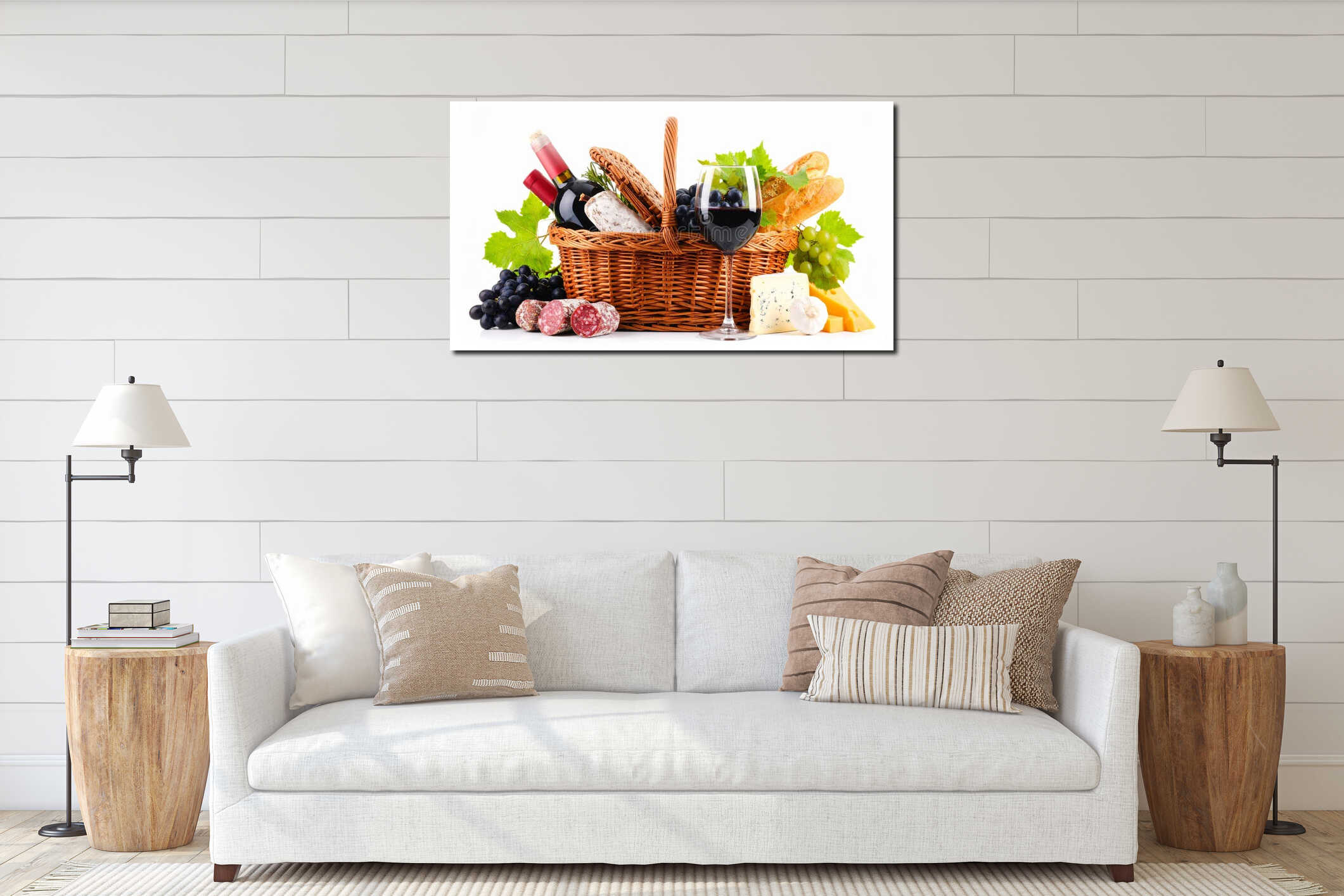 Picnic basket with wine, grapes, cheese, bread, and salami against a white background. interior mockup