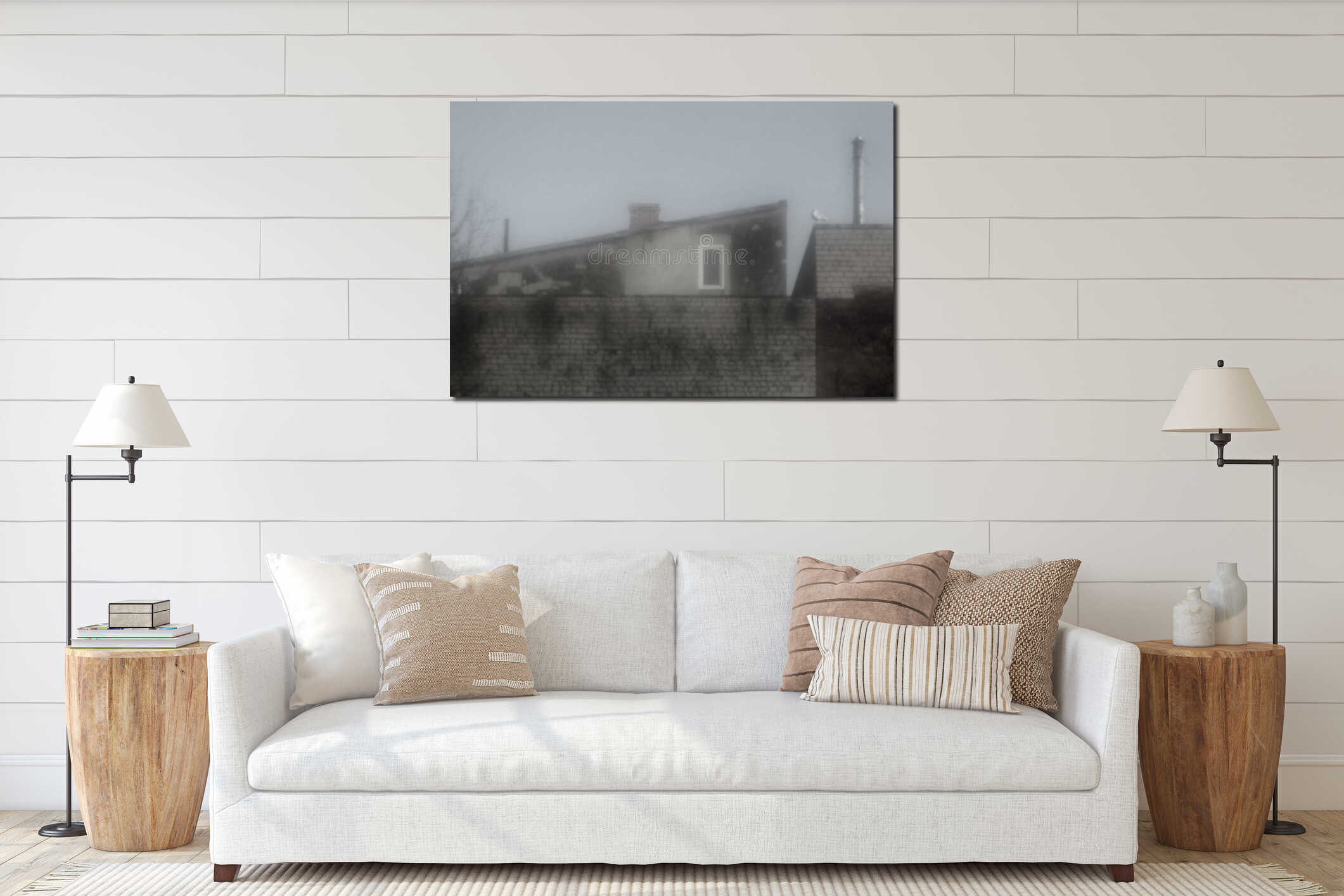 Blurry view of a weathered old building with a brick wall, single window, and a seagull perched on the roof, evoking urban decay interior mockup