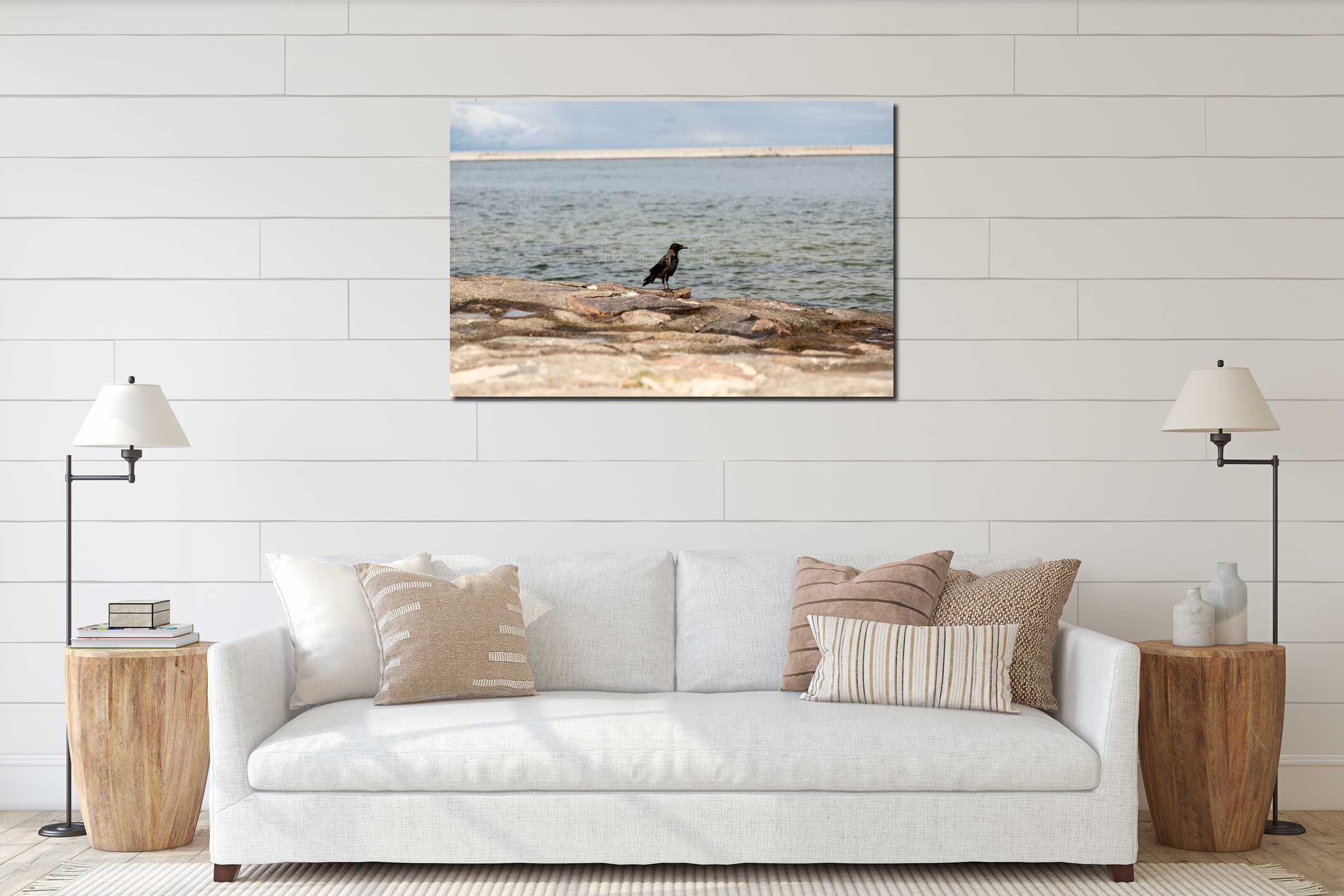 Lonely seagull on rocky beach with calm sea horizon interior mockup