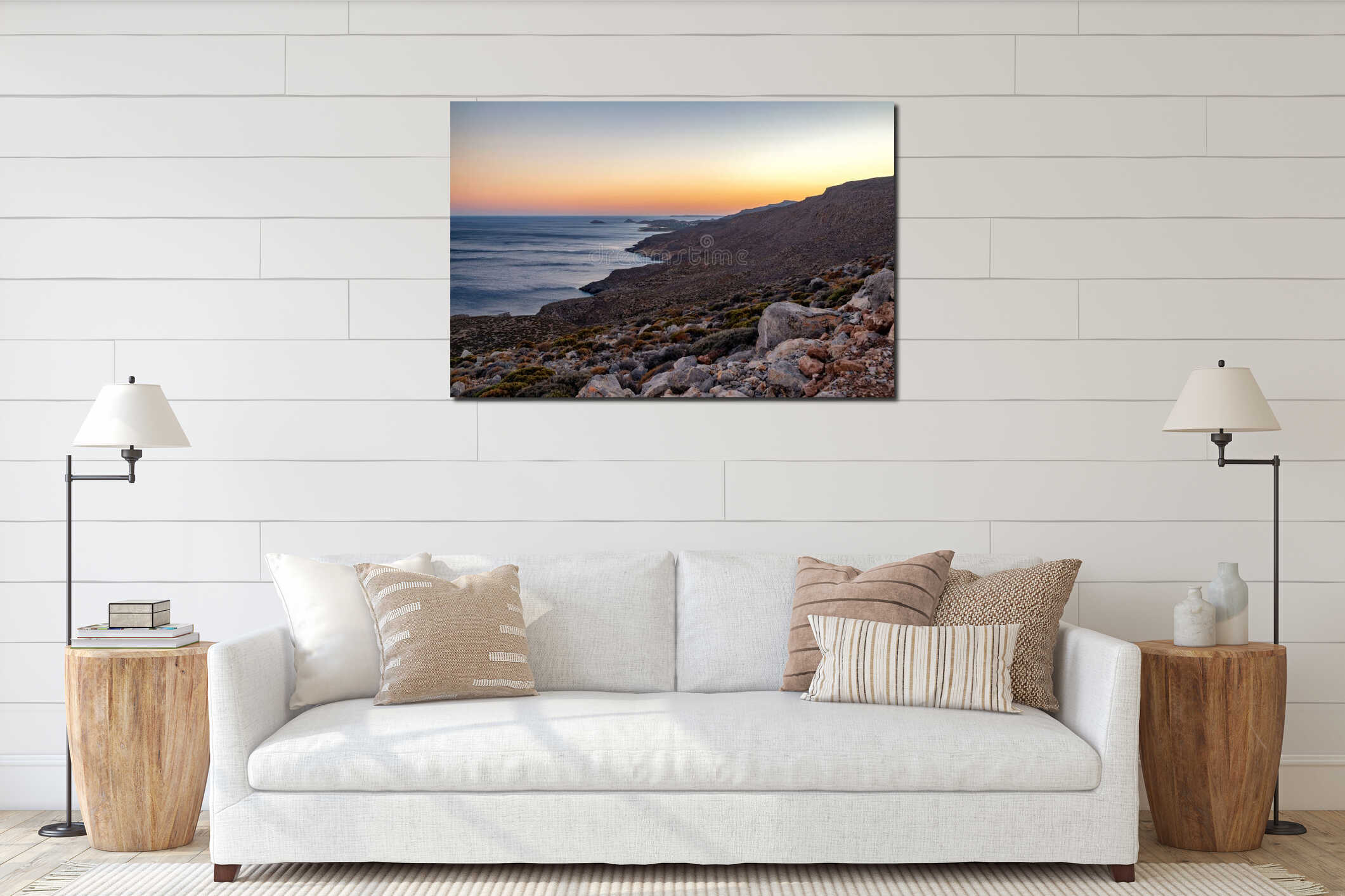 Rocky coastline and Mediterranean sea at sunset near Kato Zakros on southern coast of Crete Greece with dramatic evening sky interior mockup