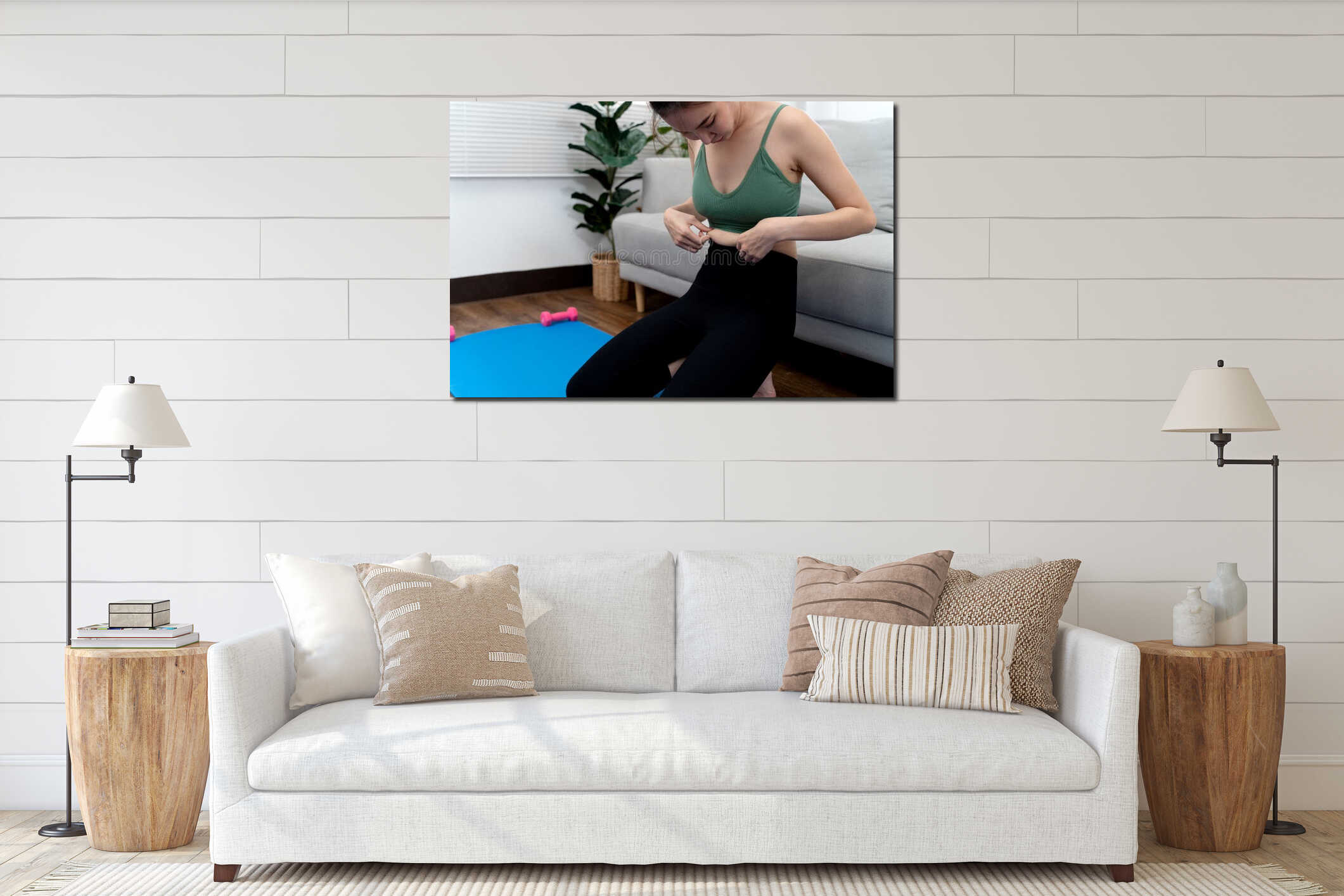 young woman in workout clothes Hand holding the fat layer on the belly area interior mockup