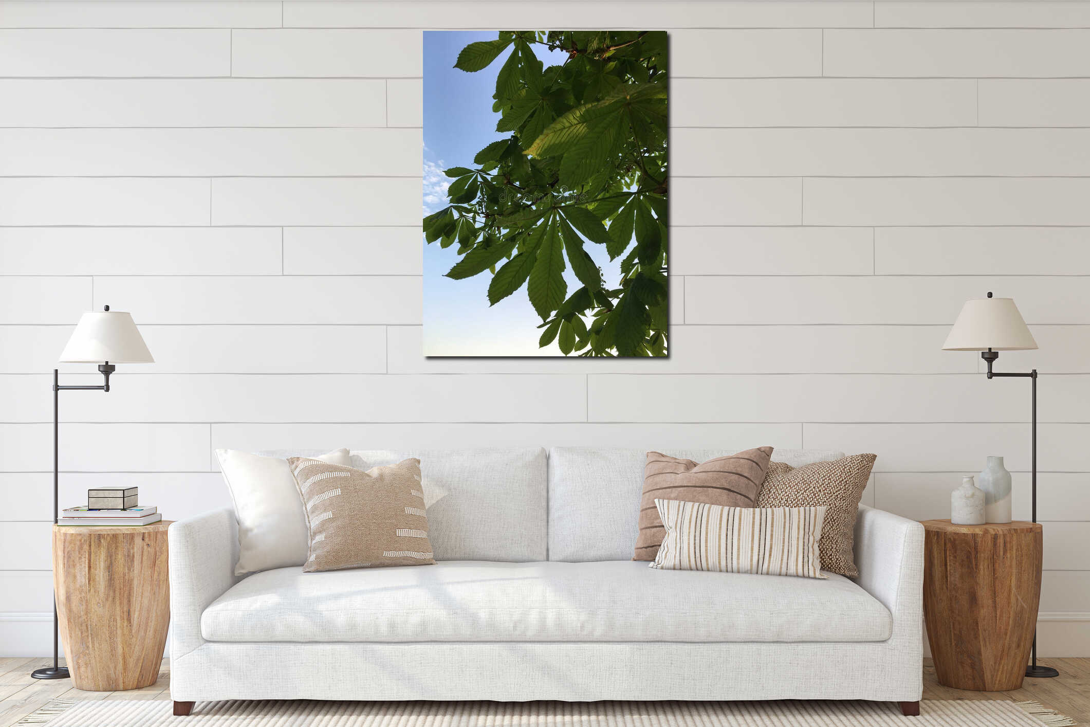 Chestnut leaves: fresh new young greenery against light-blue spring afternoon sky with small white clouds vertical low-angle interior mockup