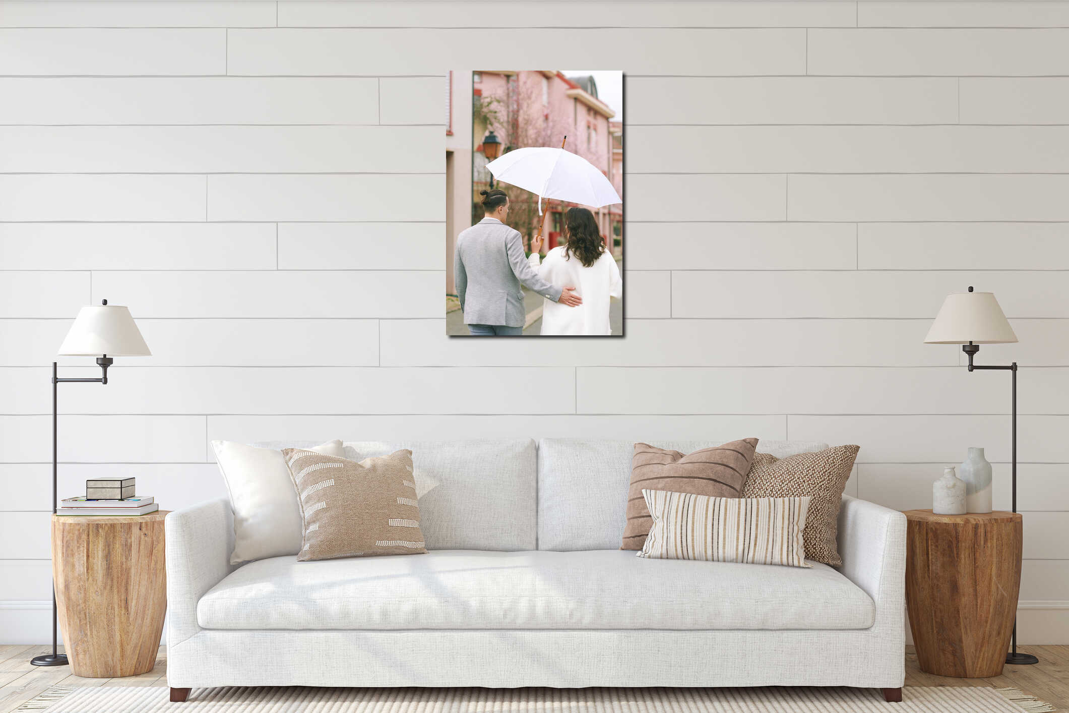 Romantic wedding couple walking together under white umbrella in light rain on quiet street interior mockup