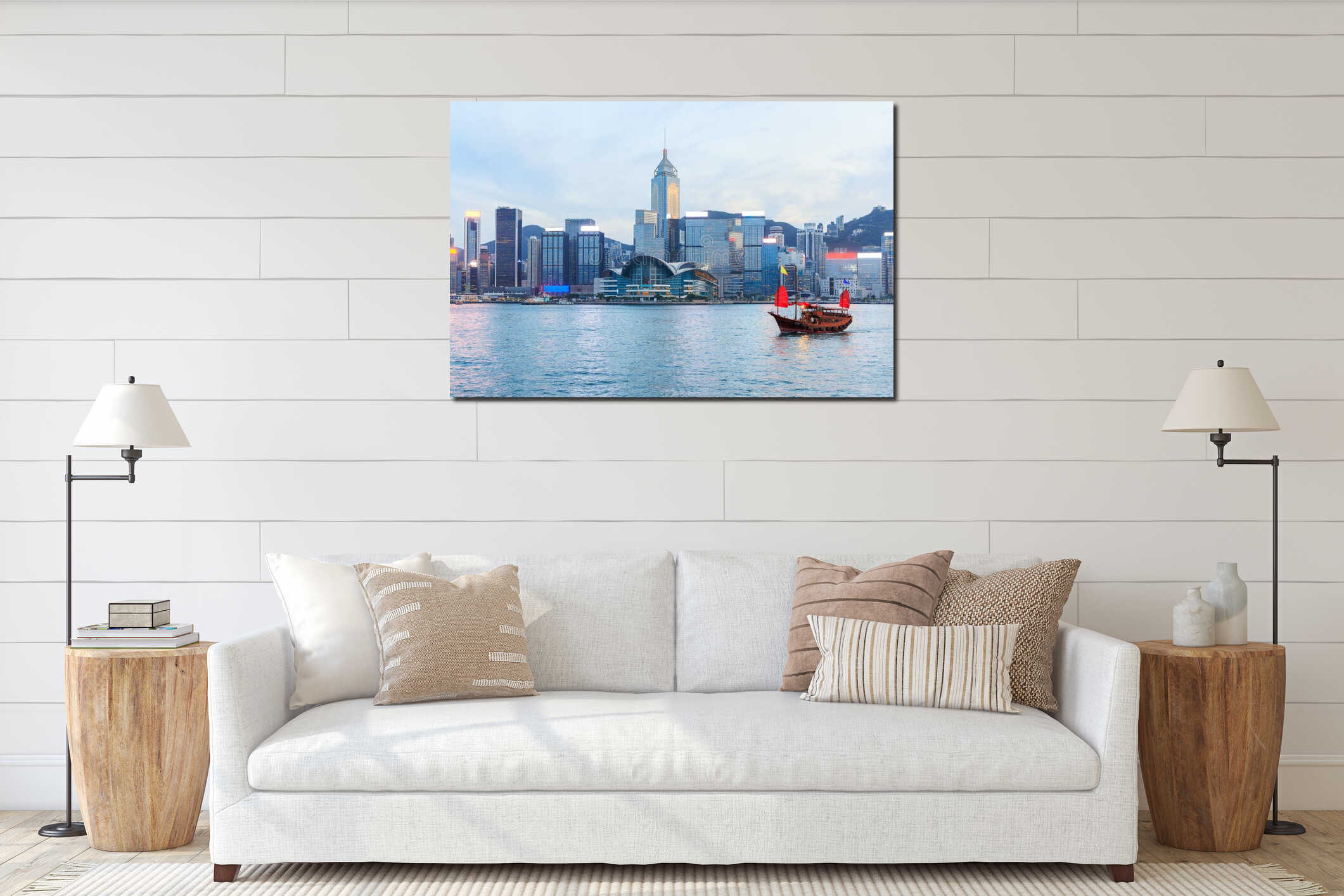 Traditional wooden junk boat with red sails against Hong Kong skyline during sunset interior mockup