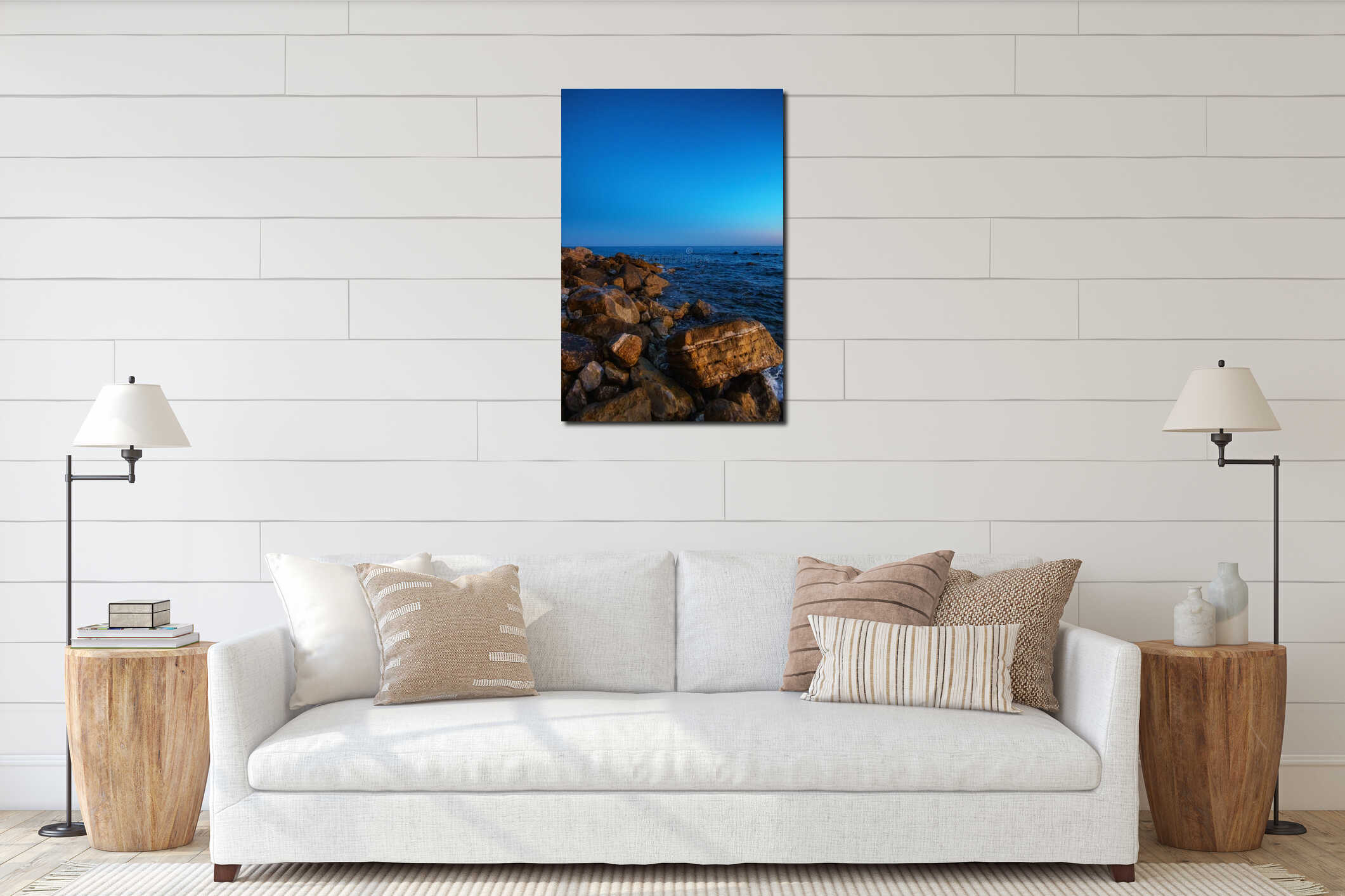 Peaceful evening on the rocky Adriatic shore under a clear blue sky in Petrovac, Montenegro. Summer vacation vibes interior mockup