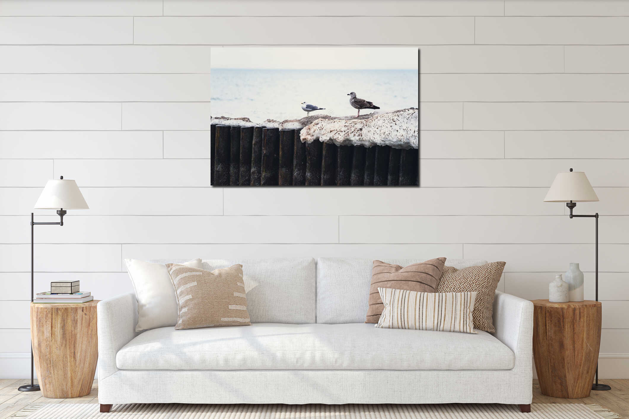 Seagull standing on a rock by the sea. Coastal bird in nature environment. Wild animal on stone shore near water. Wildlife interior mockup