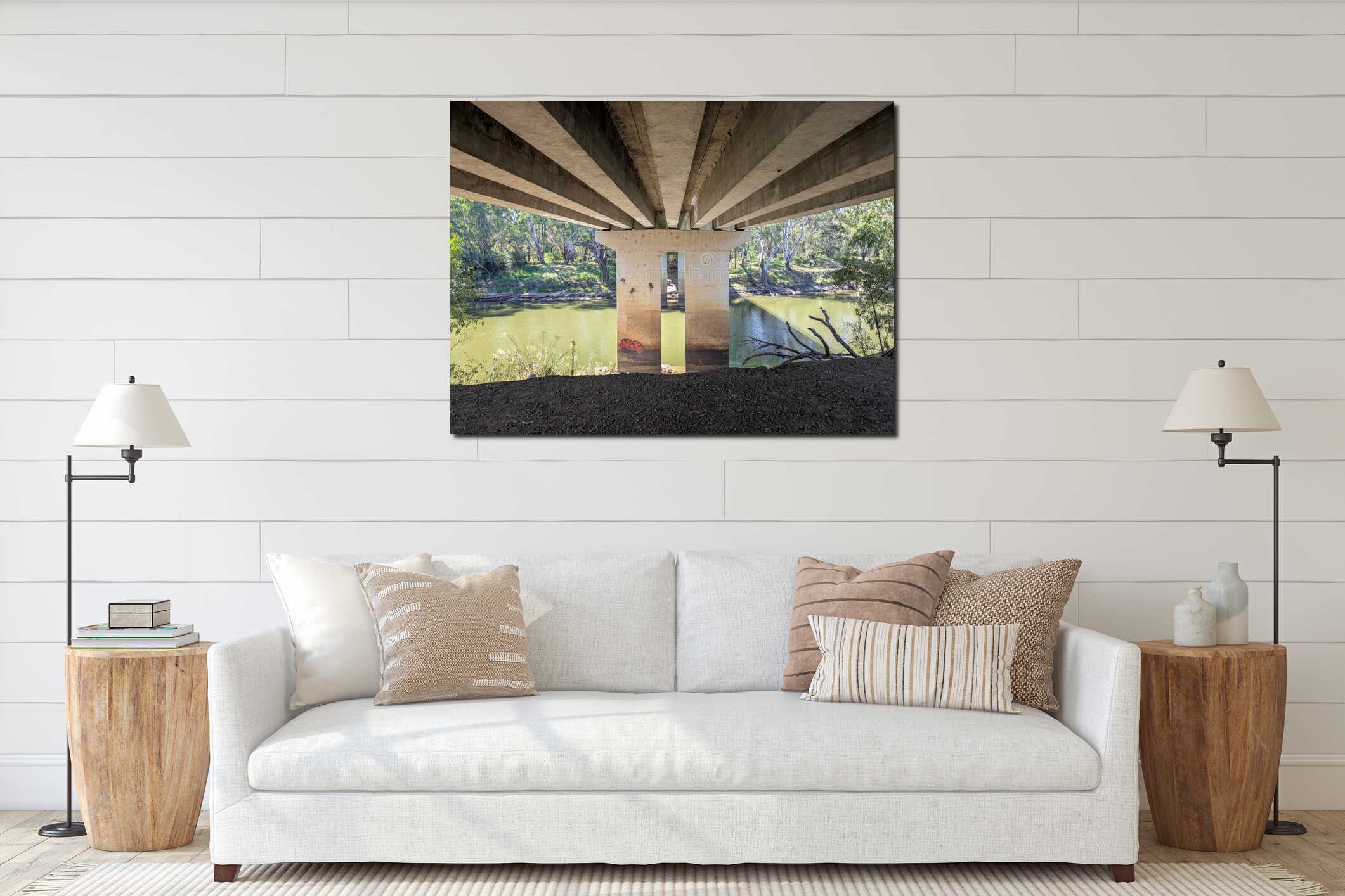 Underneath concrete bridge over green river with eucalyptus trees in rural Australia interior mockup