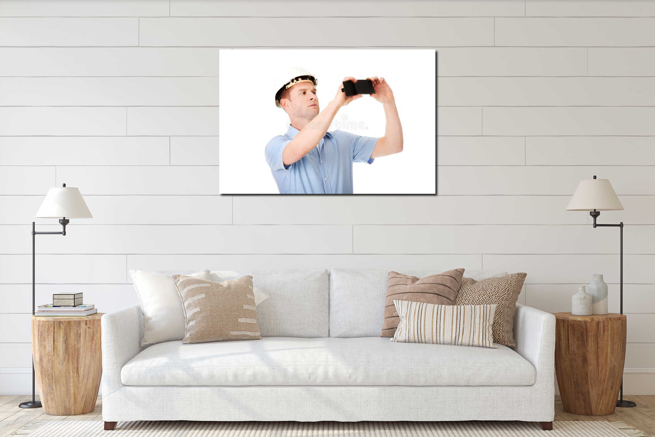 Handsome man taking photos by his mobile phone interior mockup