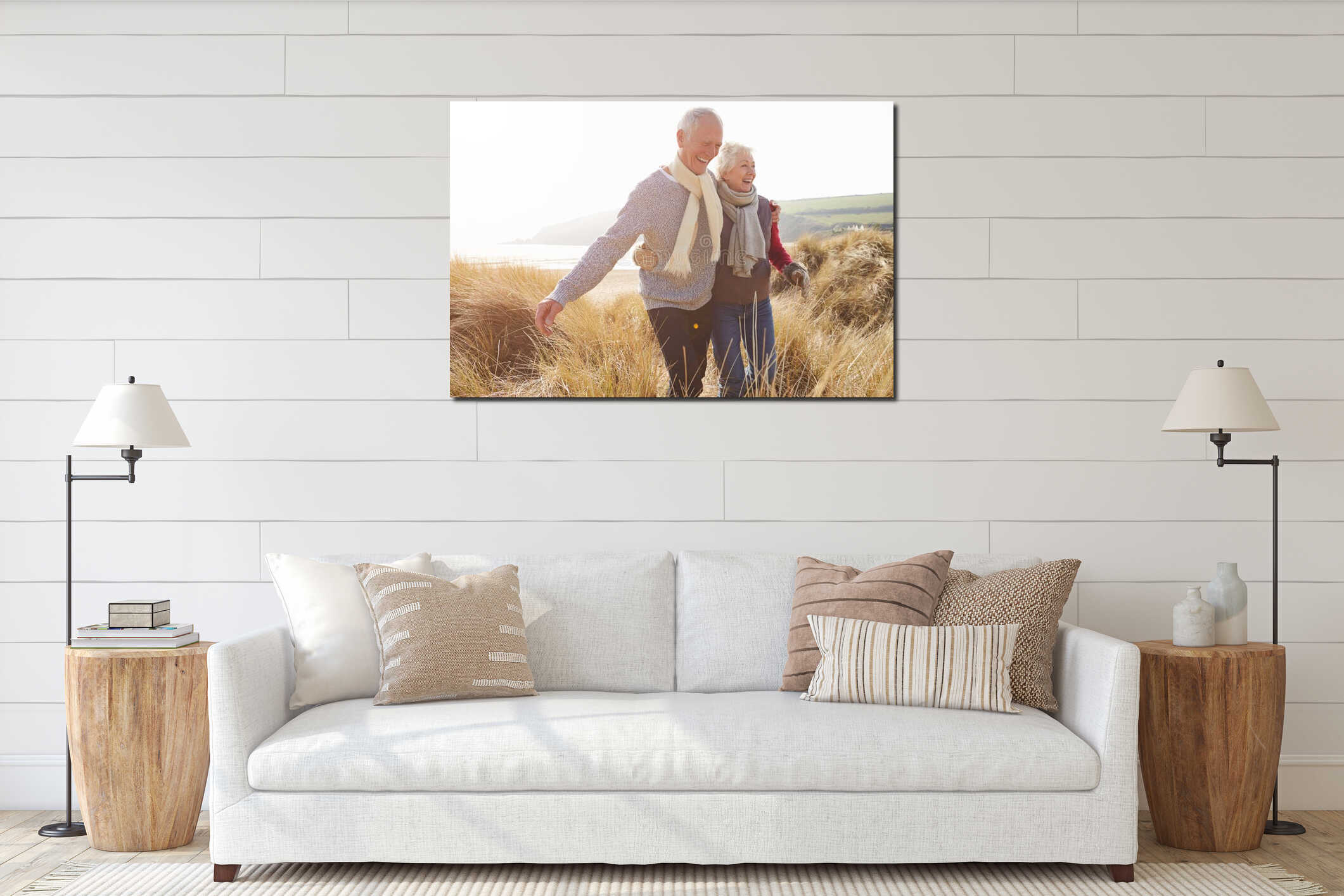 Senior Couple Walking Through Sand Dunes On Winter Beach interior mockup