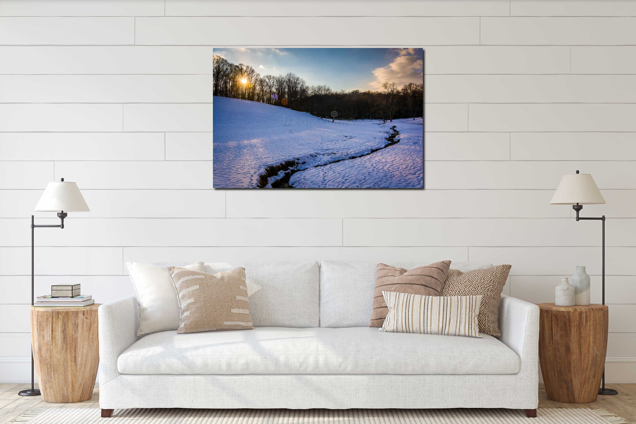Sunset over a stream in a snow-covered field in rural Baltimore interior mockup