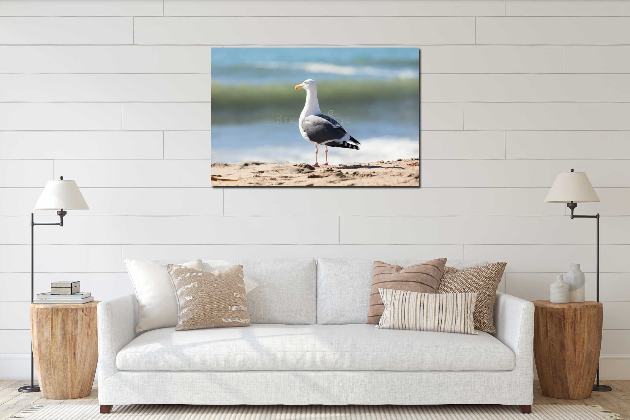 Seagull staying on shoreline beach half-turned by back to the viewer interior mockup