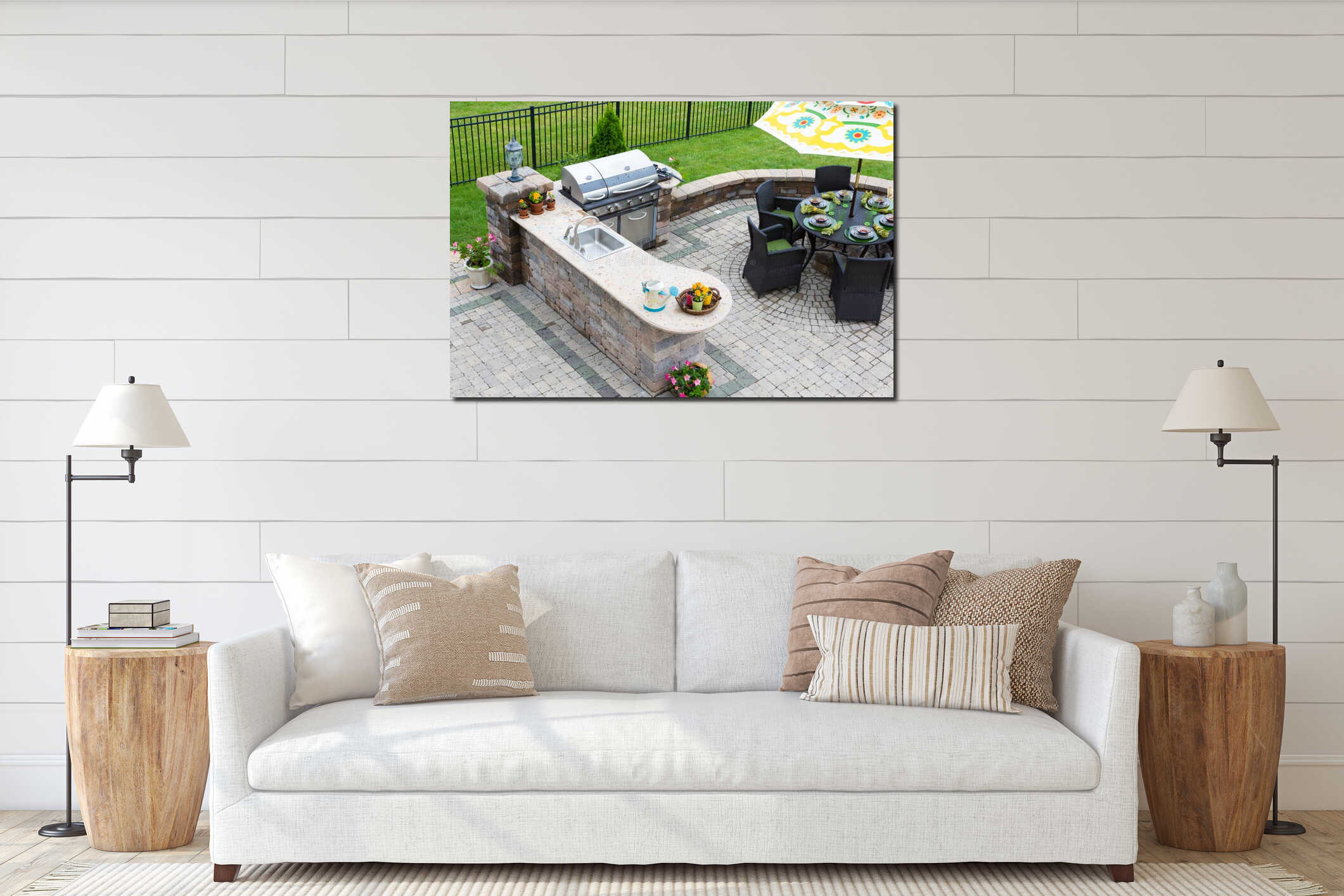 Outdoor kitchen and dining table on a paved patio interior mockup