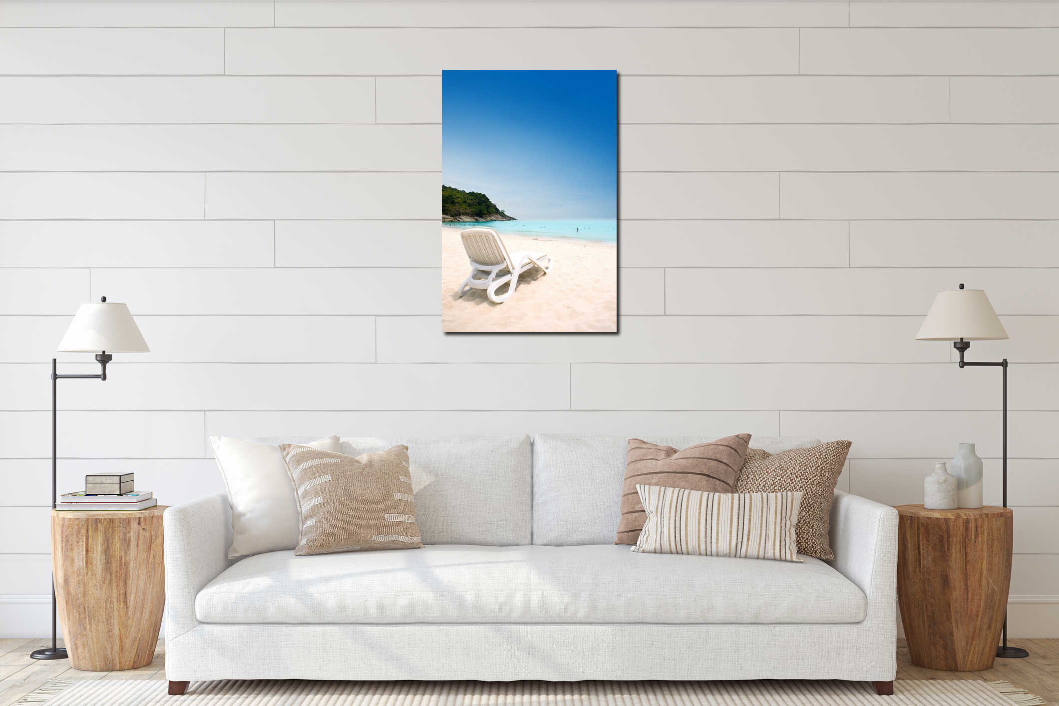 Sun lounger on sandy beach against blue sky interior mockup