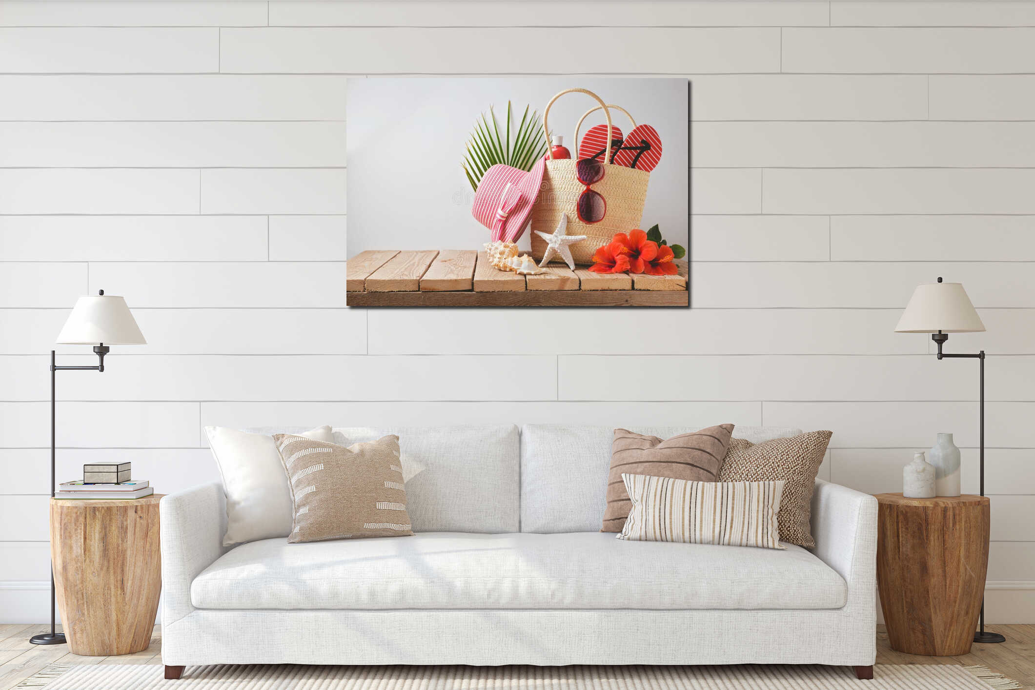 Summer beach bag and hibiscus flowers on wooden table. Summer holiday vacation concept. View from above interior mockup