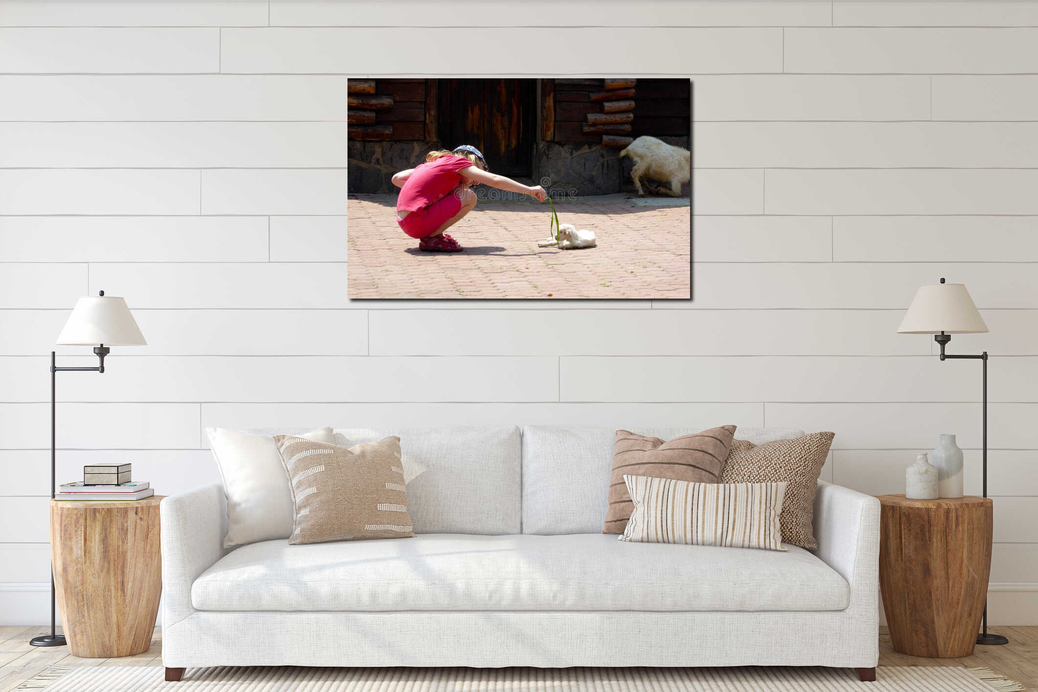 A young girl feeding a little goat interior mockup