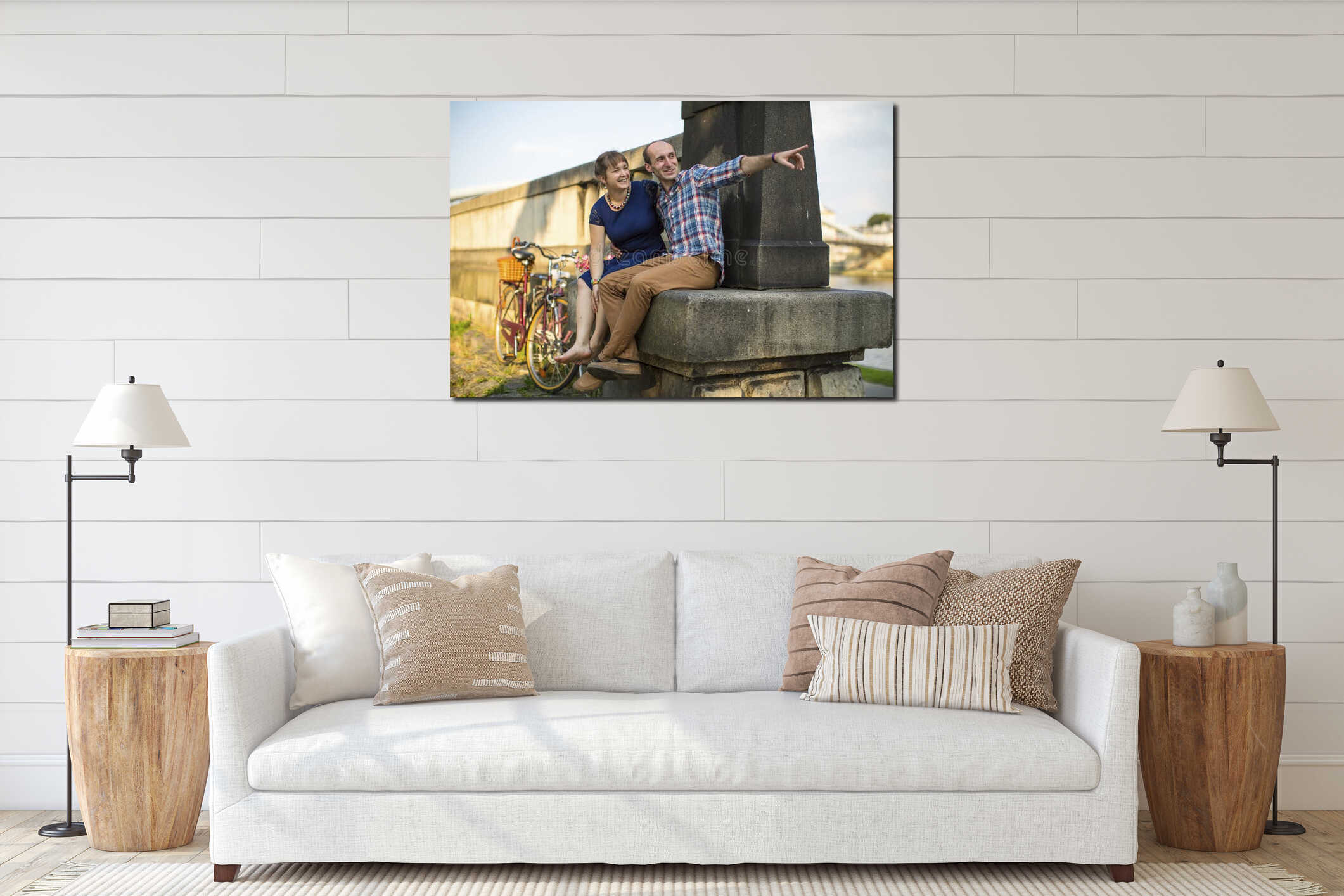 Couple in love sitting on the curb embankment and passionately talking. interior mockup