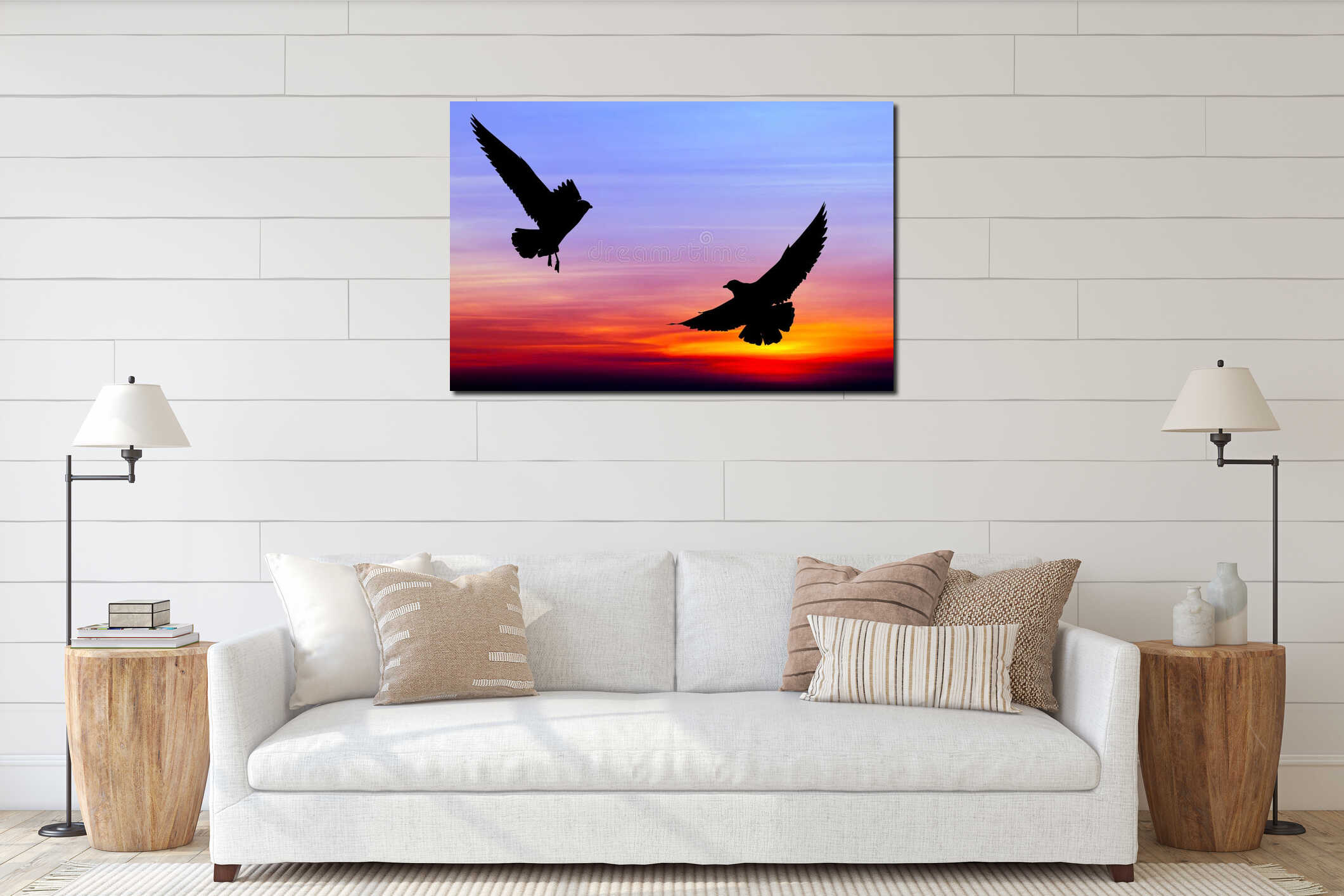 Silhouetted two seagull flying at sunset interior mockup